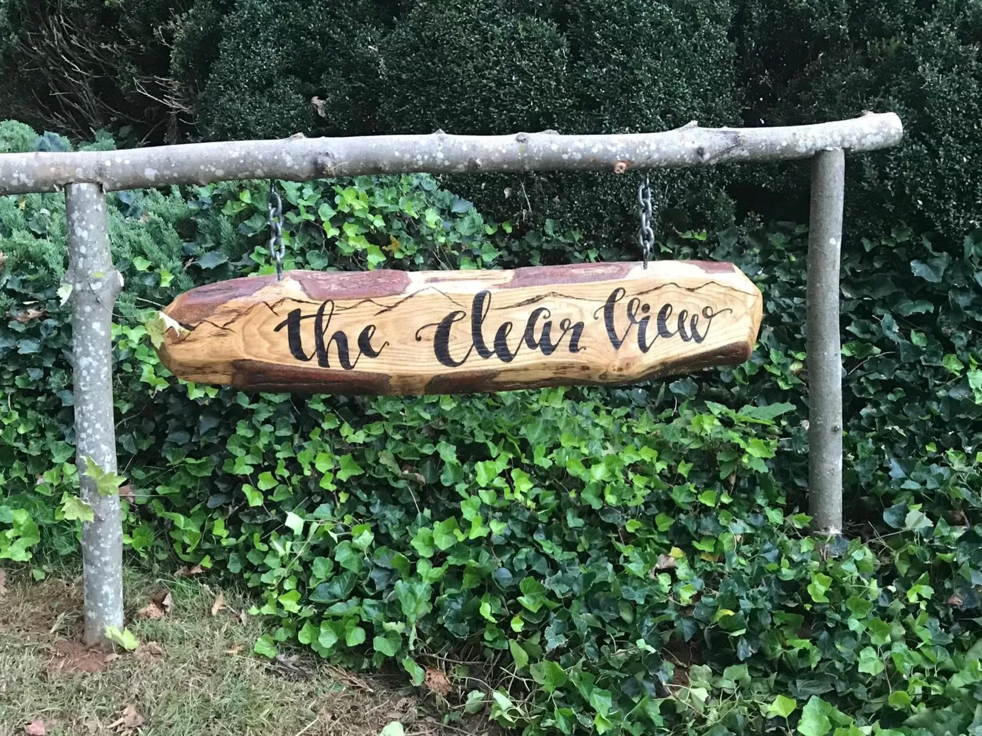 Property logo or sign in Mountain Aire Cottages, Inn, & Glamping