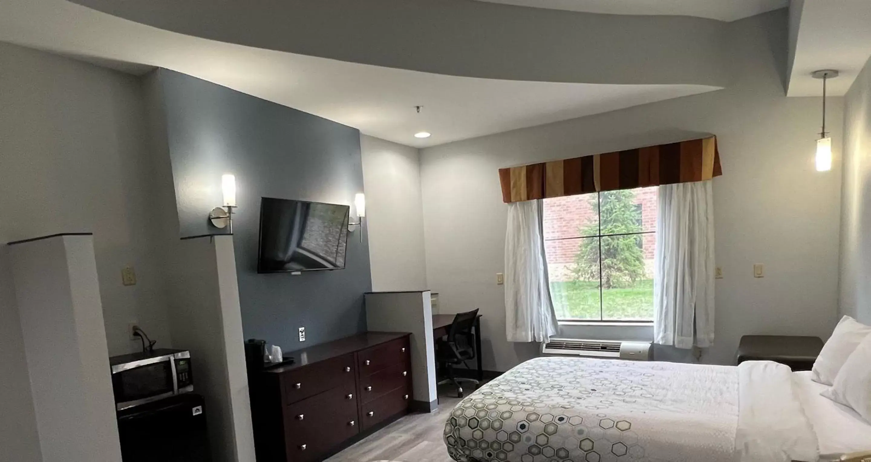 Photo of the whole room, Bed in HomeTowne Studios & Suites by Red Roof Washington Photo of the whole room, Bed in HomeTowne Studios & Suites by Red Roof Washington