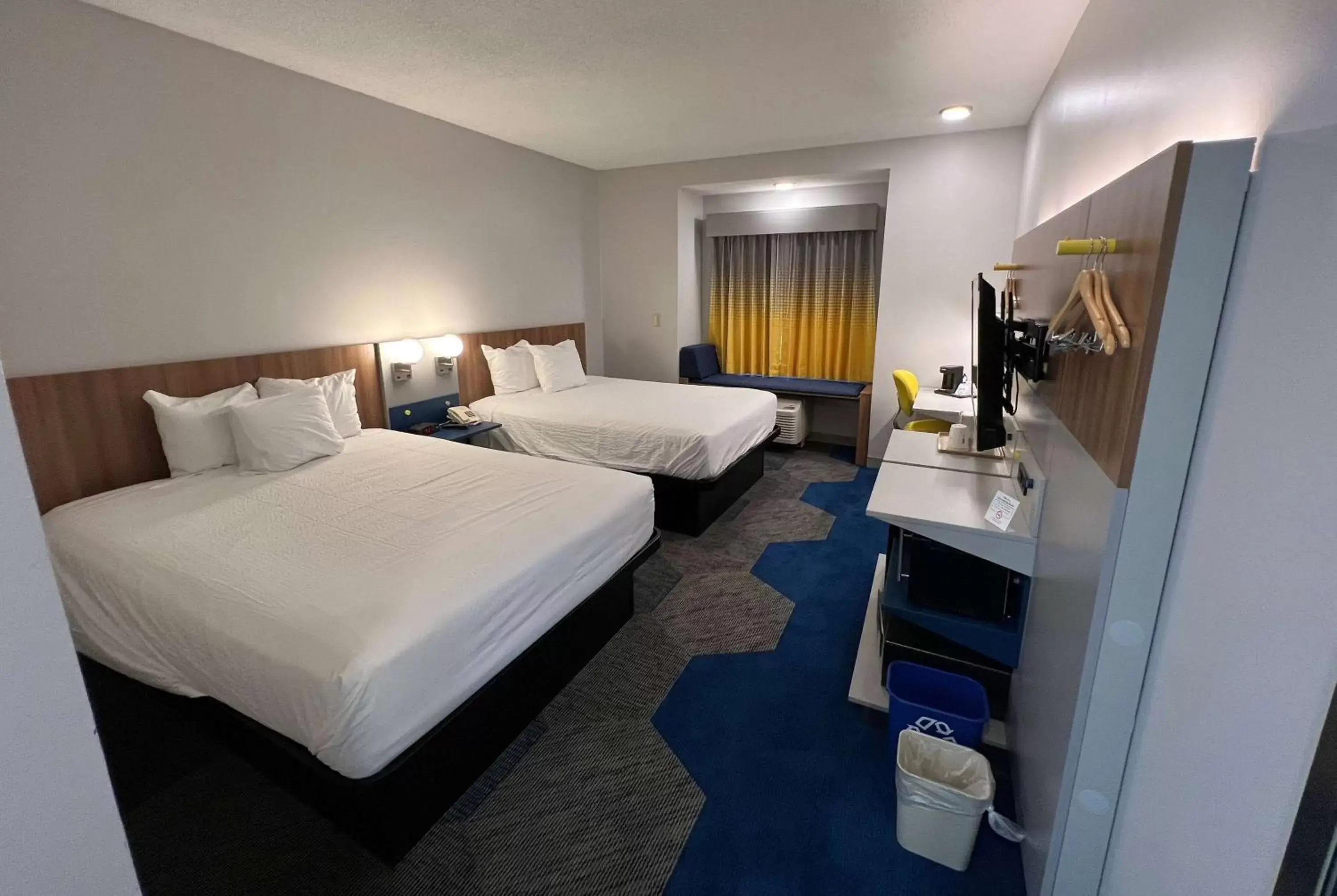 Bed in Microtel Inn & Suites by Wyndham Charlotte/Northlake