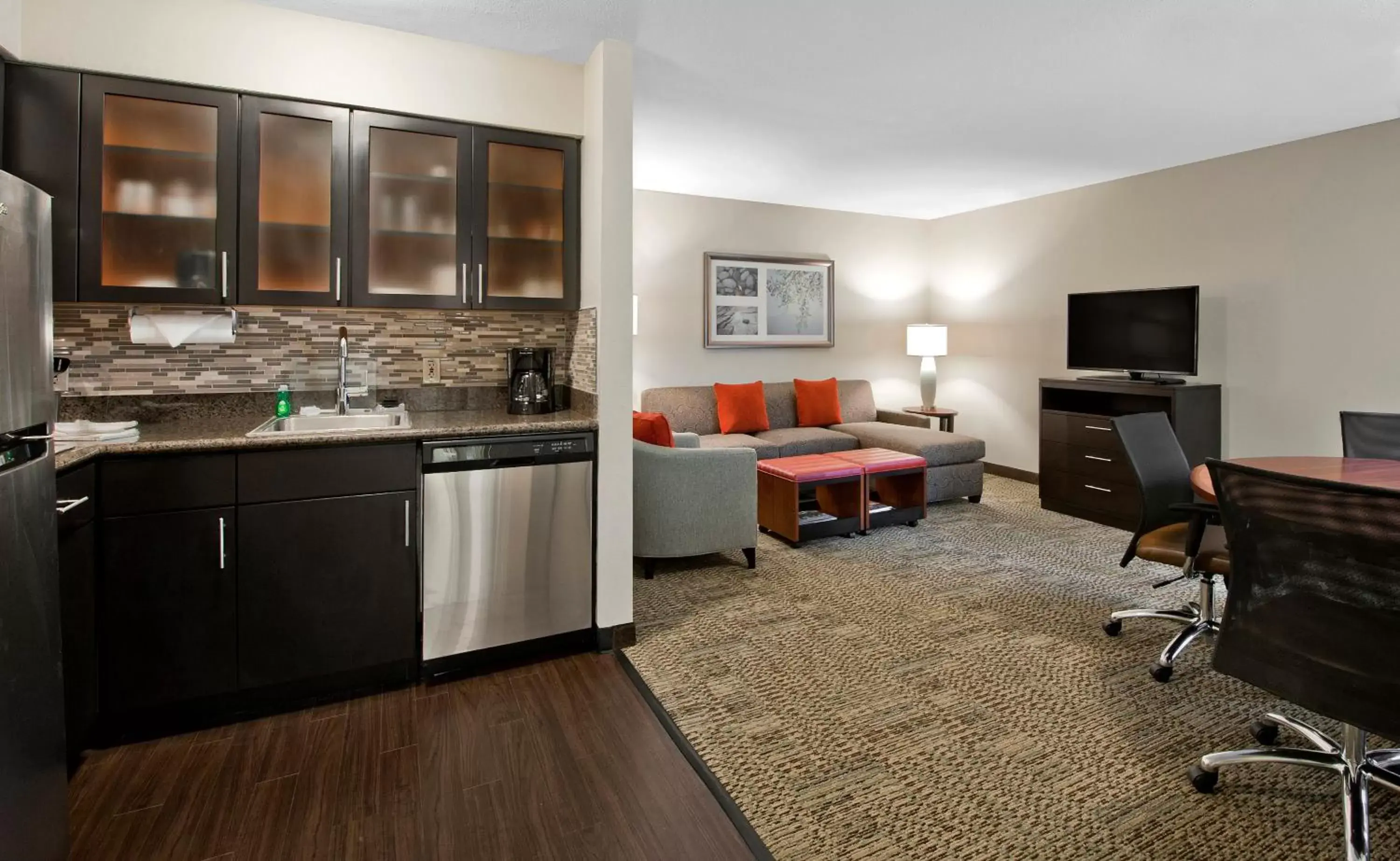 Photo of the whole room, Kitchen/Kitchenette in Staybridge Suites - Charlotte Ballantyne, an IHG Hotel