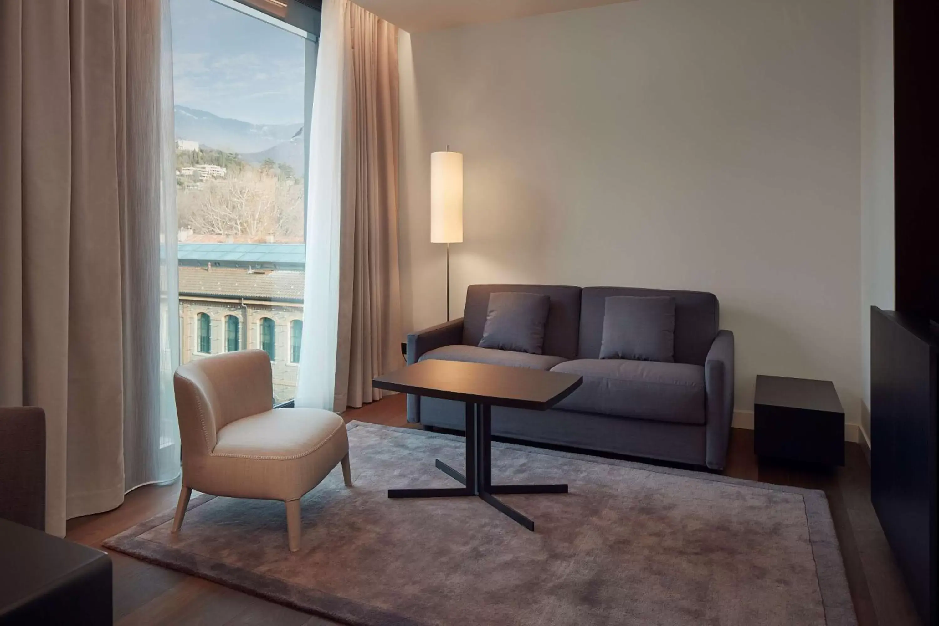 Living room, Seating Area in Hilton Lake Como