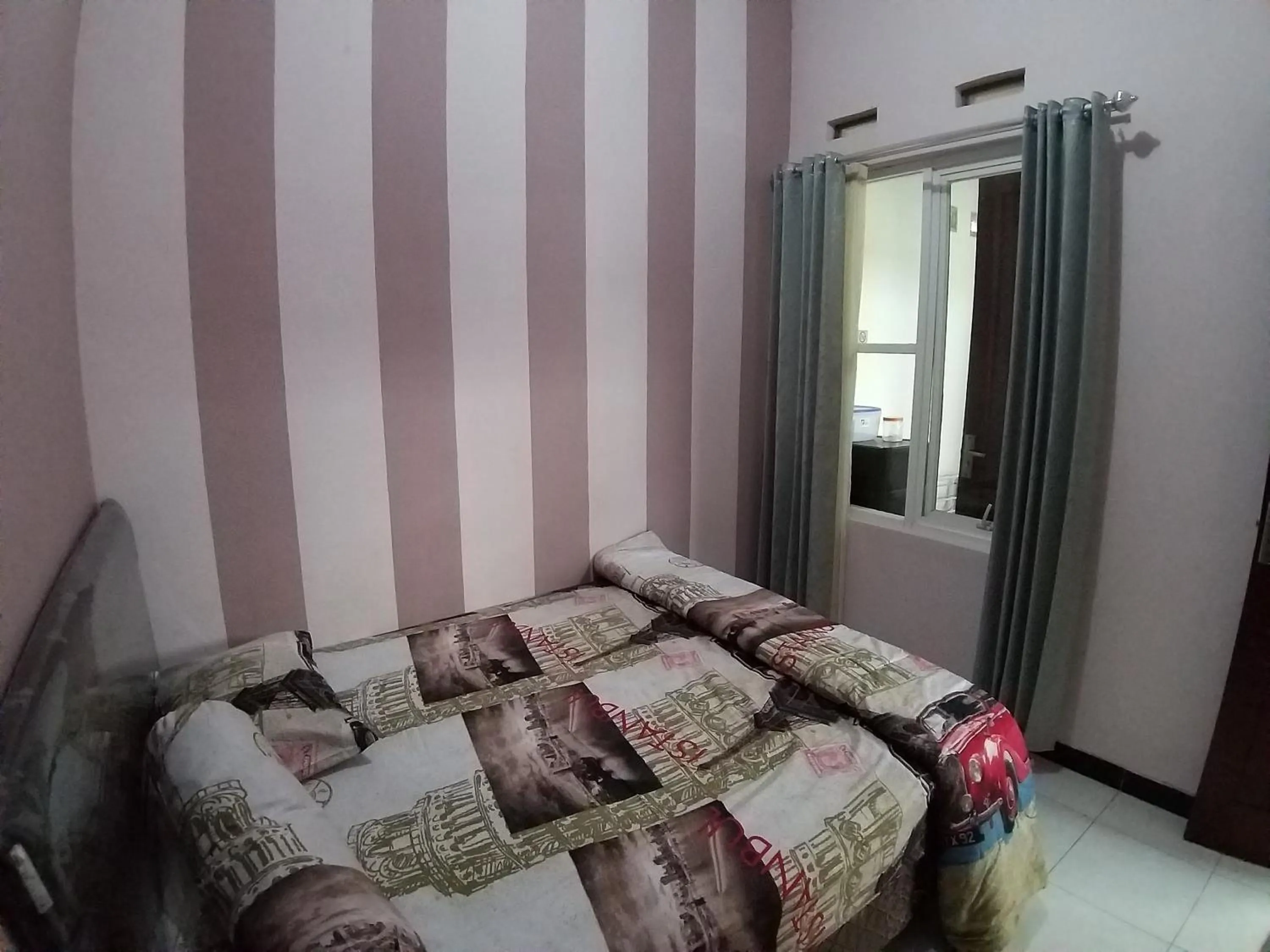 Bed in Ken's Villa 8