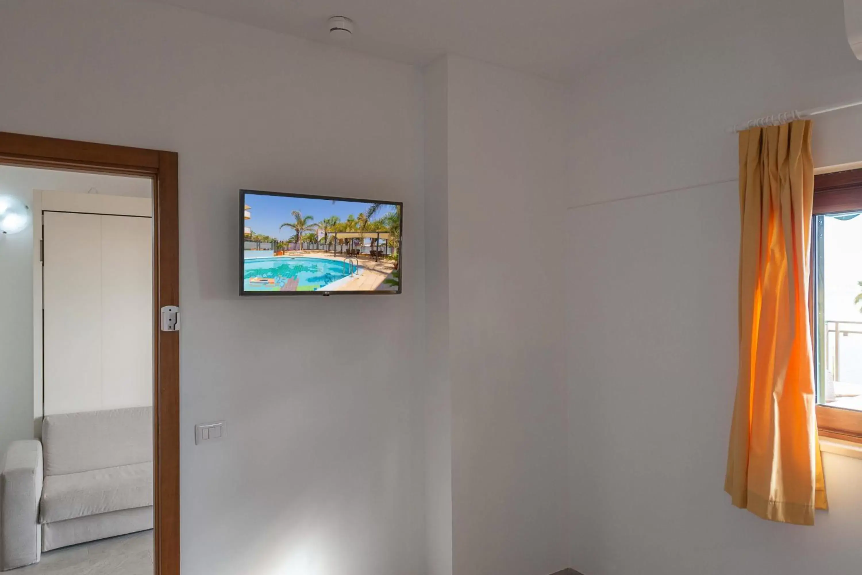 Bedroom, TV/Entertainment Center in Residence Playa