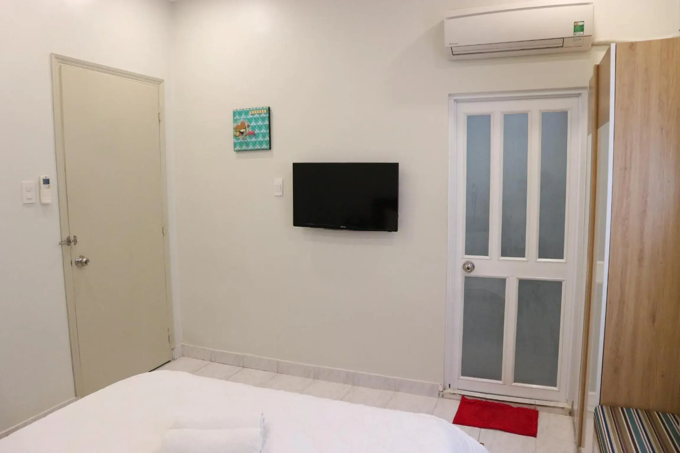 Bedroom, TV/Entertainment Center in Long Hostel