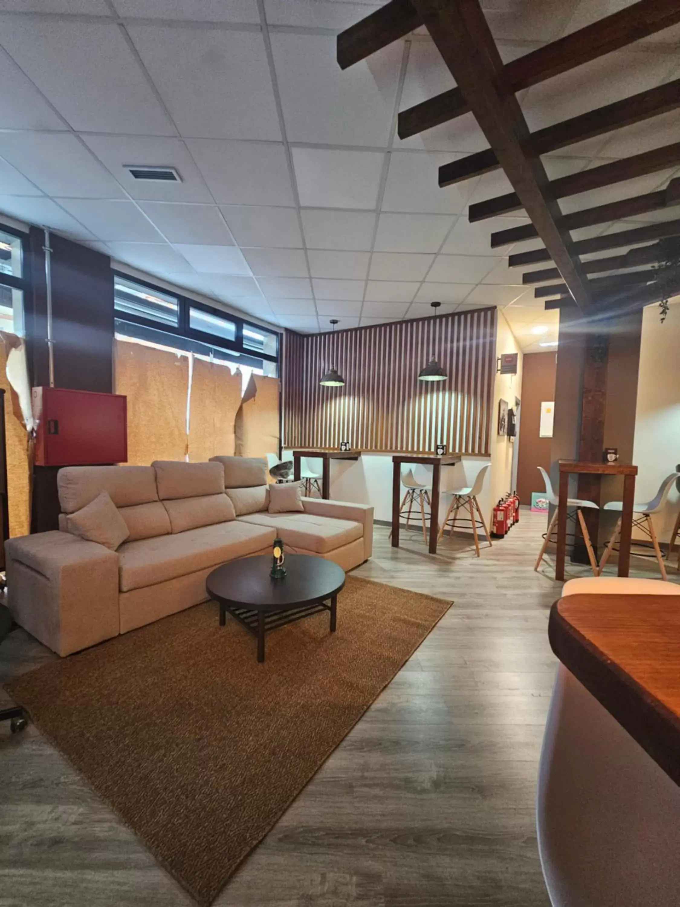 Communal lounge/ TV room in Hostel Llanes