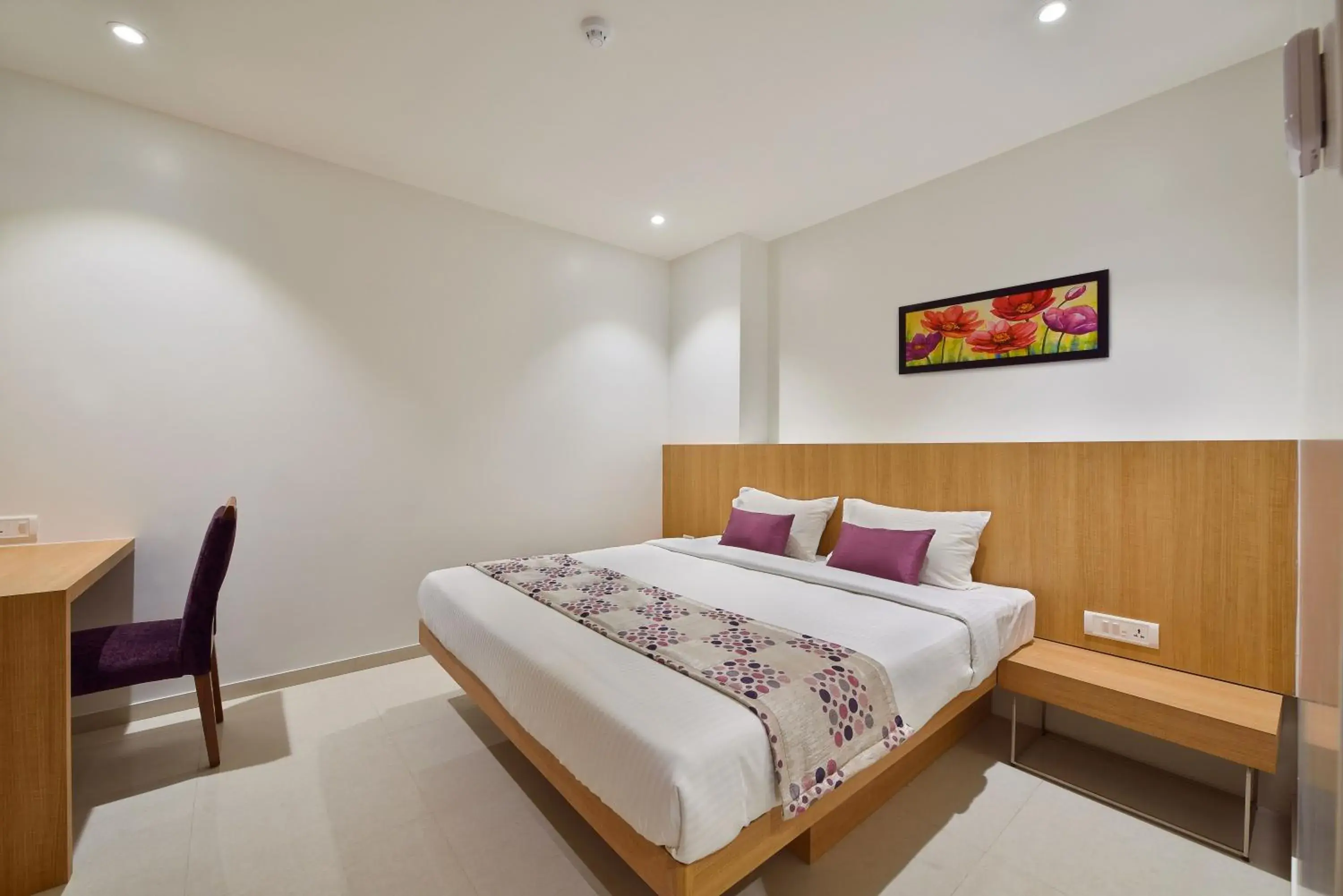 Bed in Hotel Leafio Mumbai