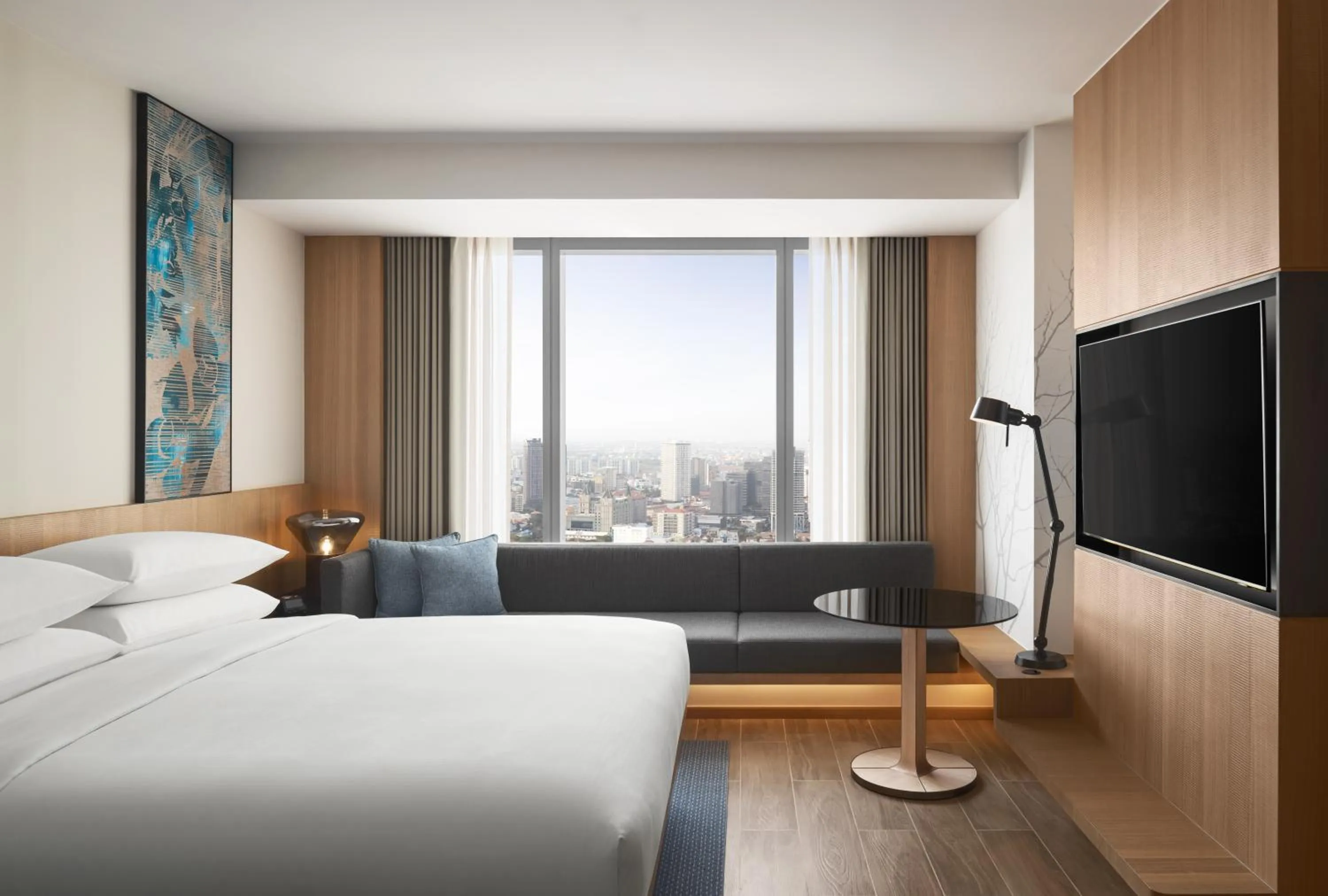 Communal lounge/ TV room, Bed in Fairfield by Marriott Phnom Penh