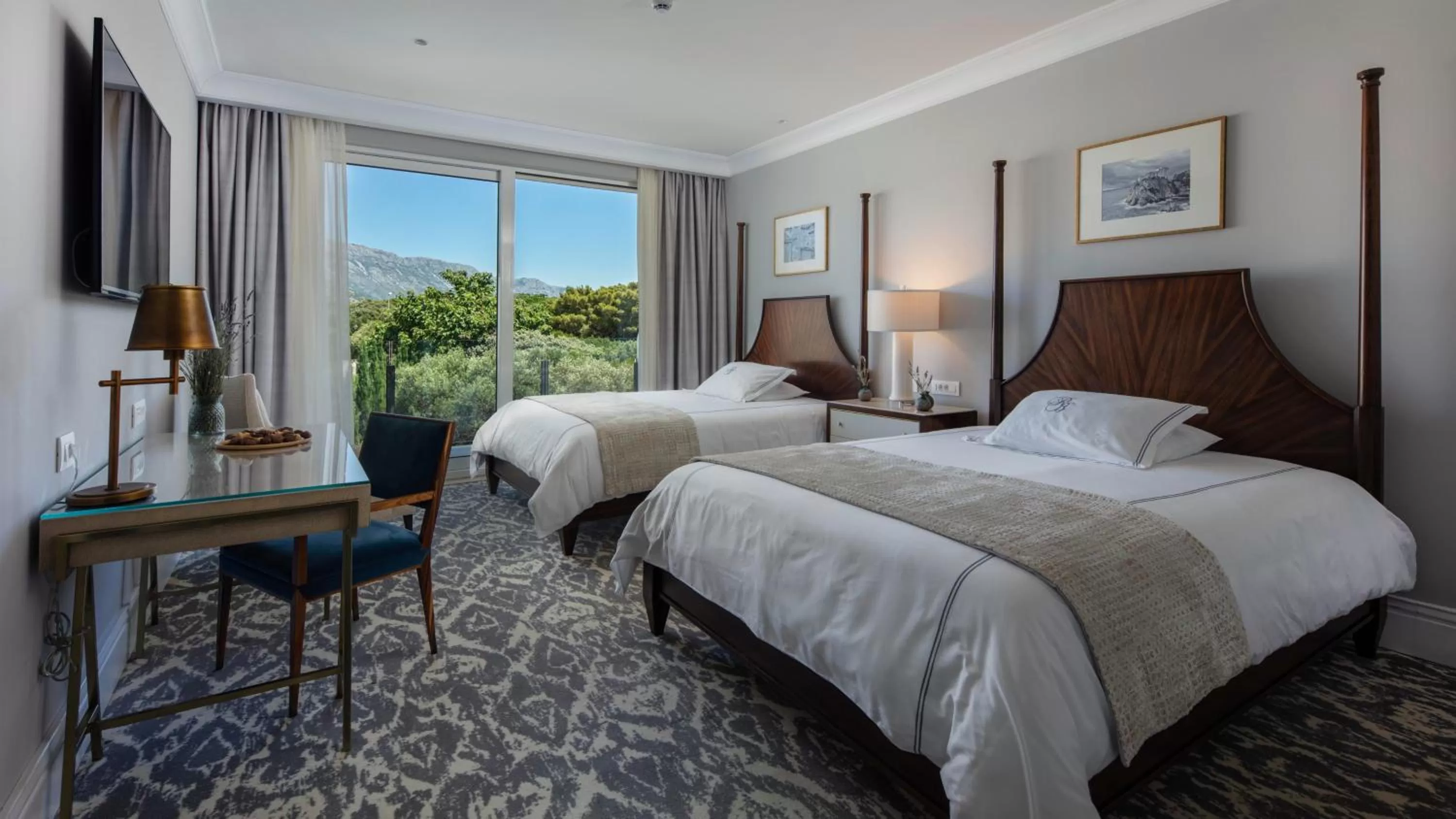 Bed in Royal Blue Hotel