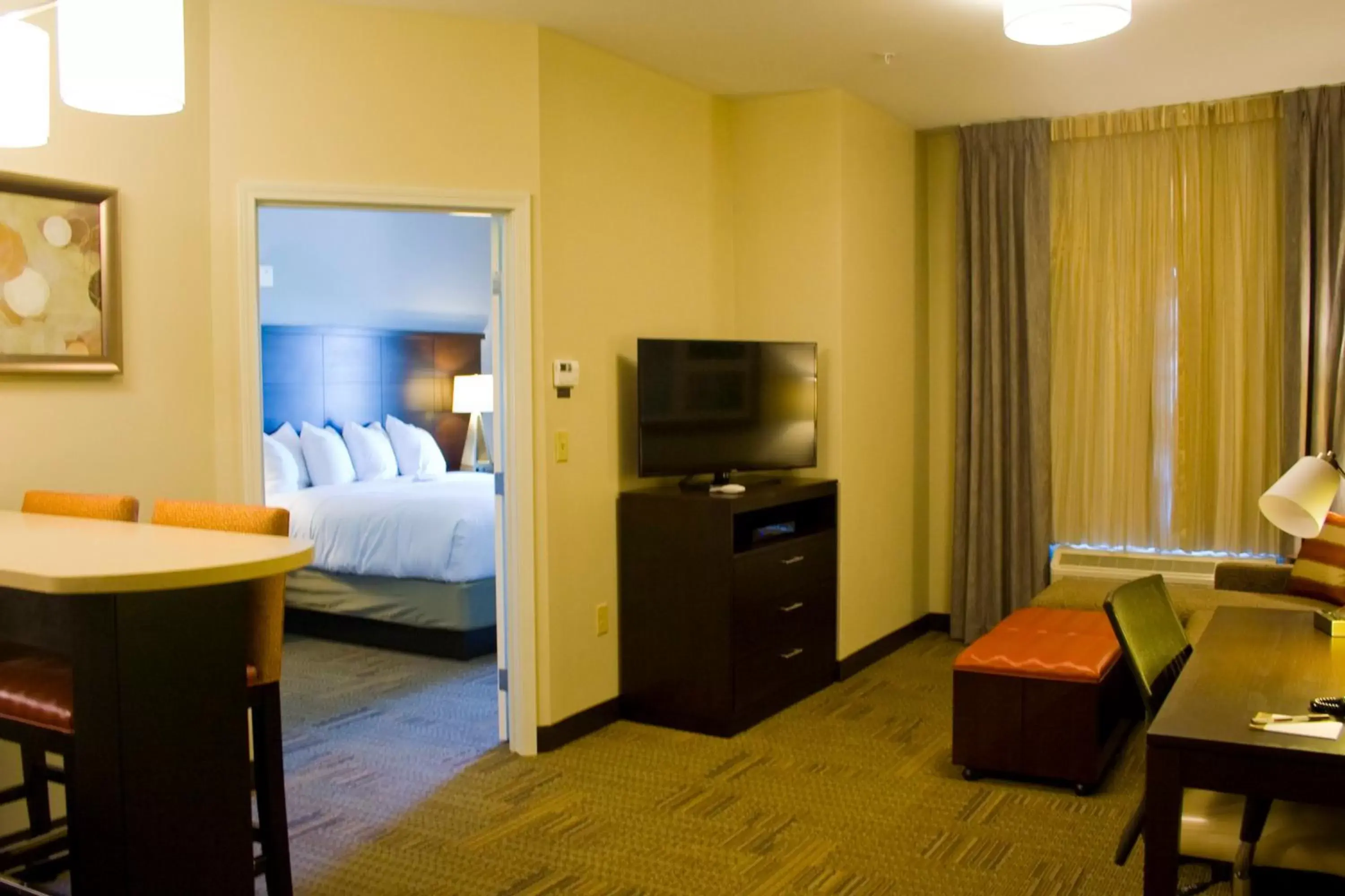 Photo of the whole room, TV/Entertainment Center in Staybridge Suites Toledo - Rossford - Perrysburg, an IHG Hotel