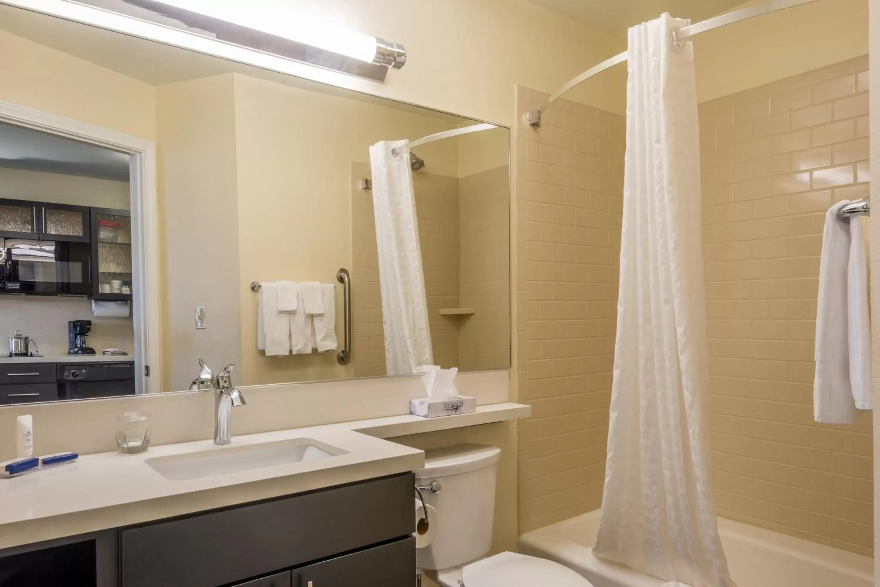 Bathroom in Candlewood Suites Del City, an IHG Hotel