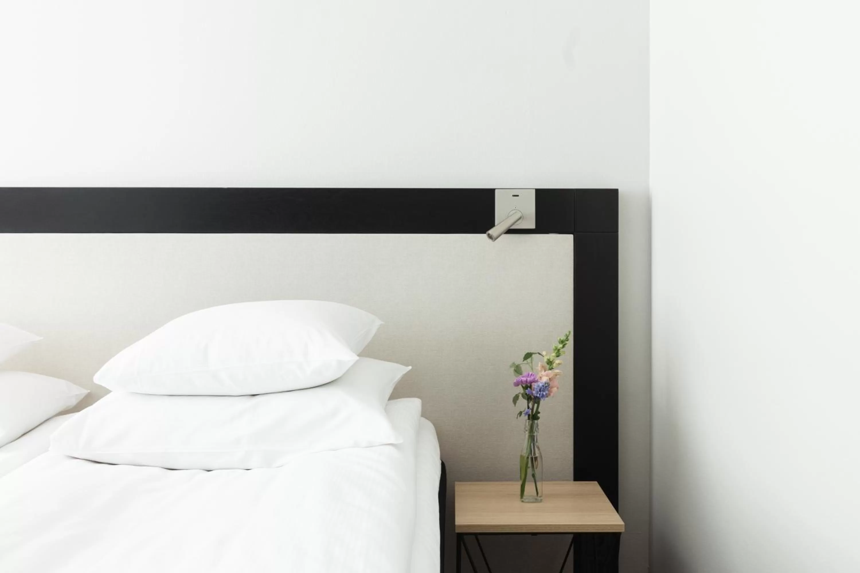 Bed in GLO Hotel Art