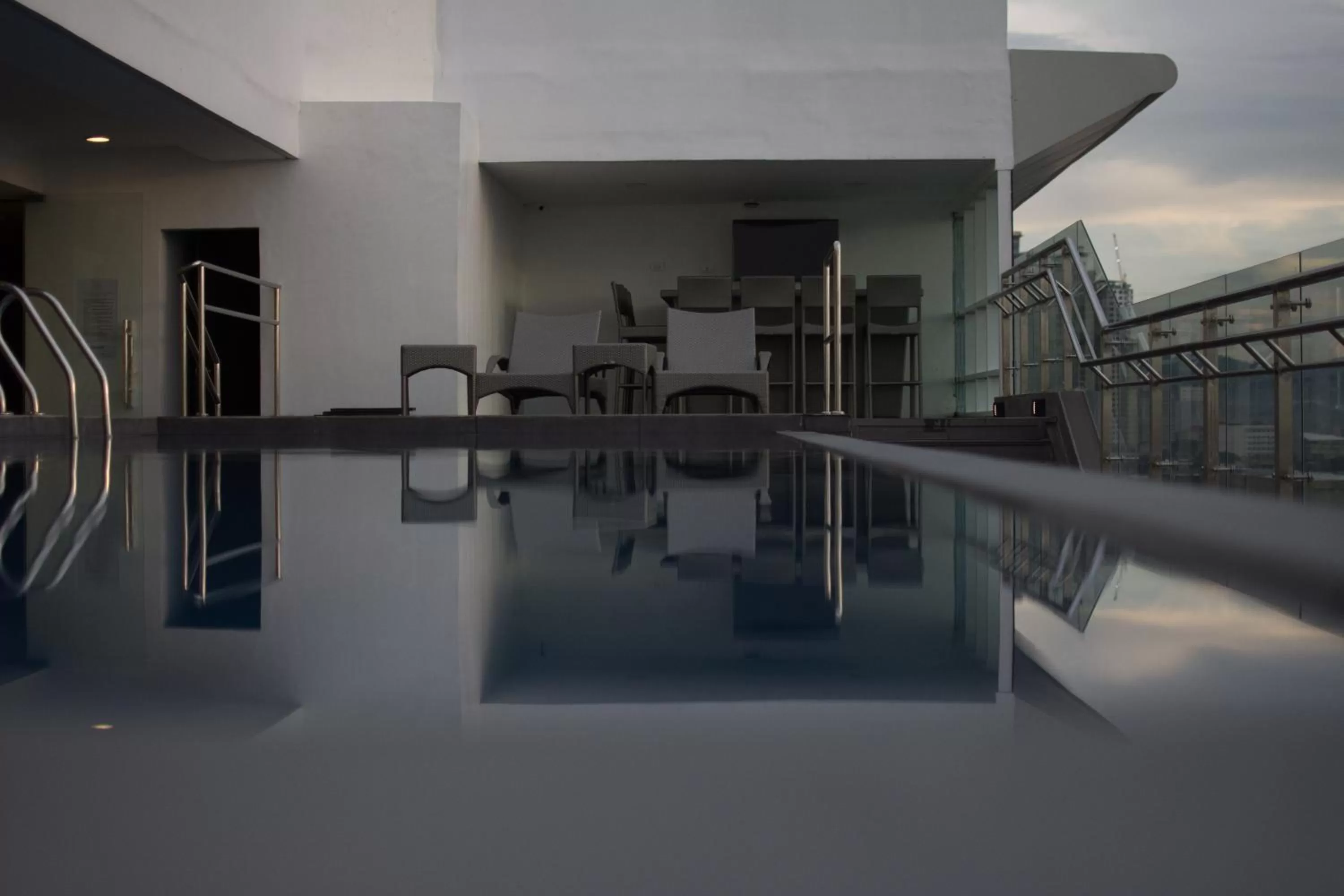 Lounge or bar in One Central Hotel & Suites