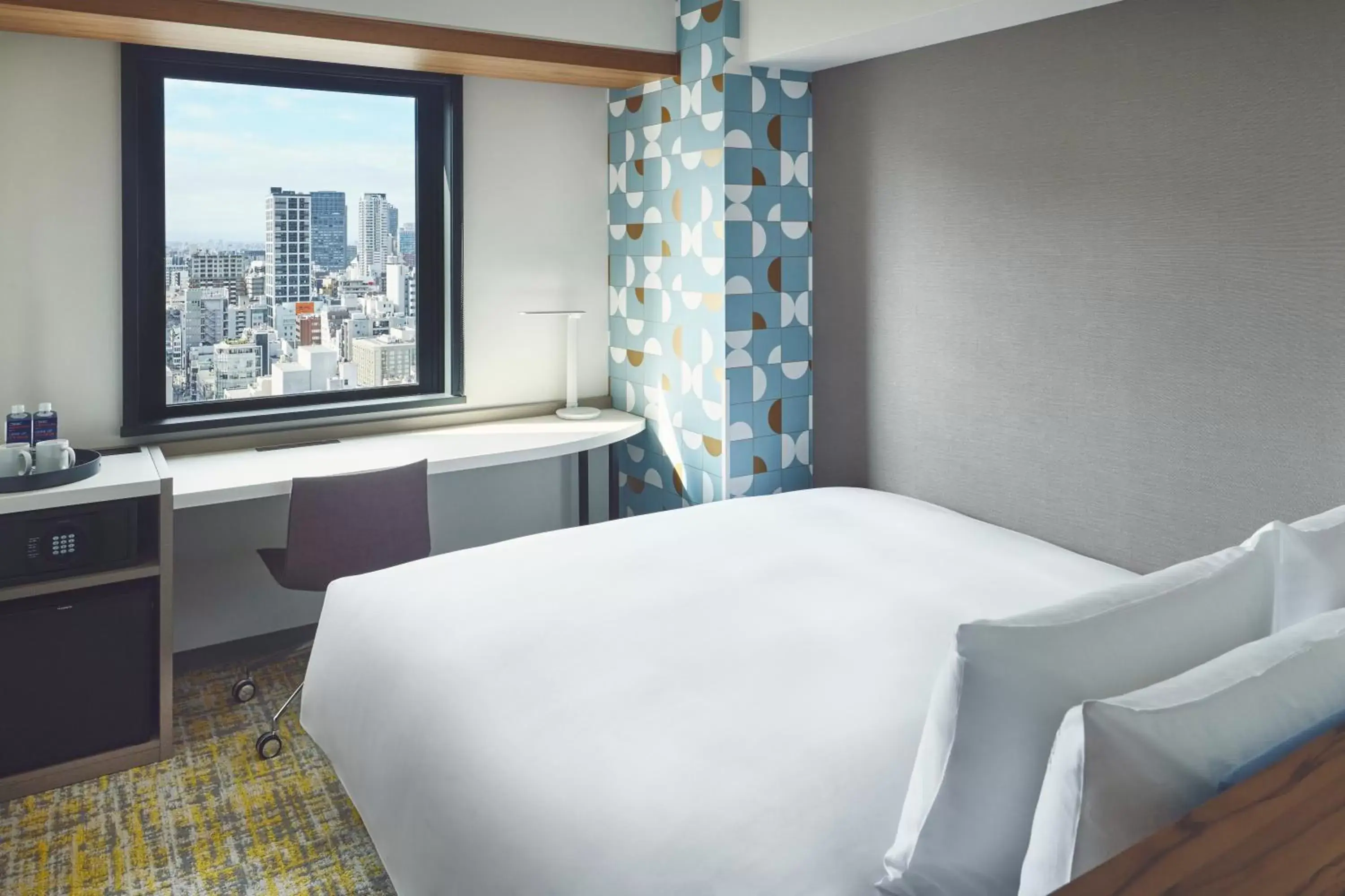 Bed in Holiday Inn Express Osaka City Centre- Midosuji, an IHG Hotel