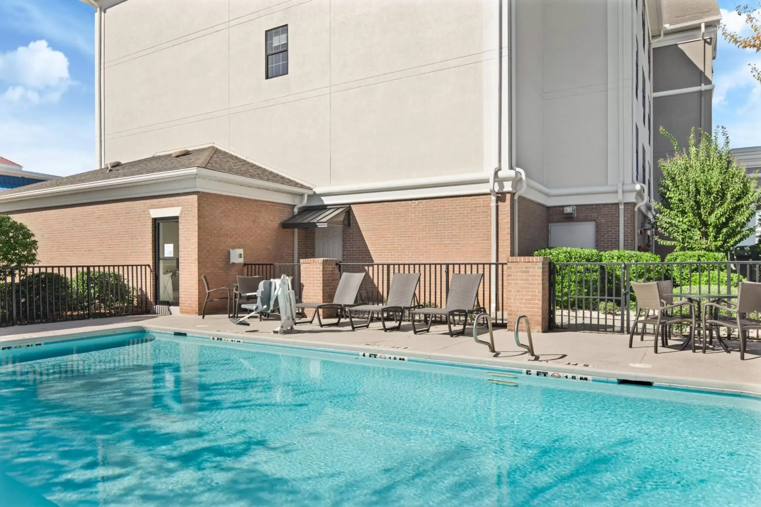Swimming pool, Property Building in Holiday Inn Express Hotel & Suites Byron, an IHG Hotel