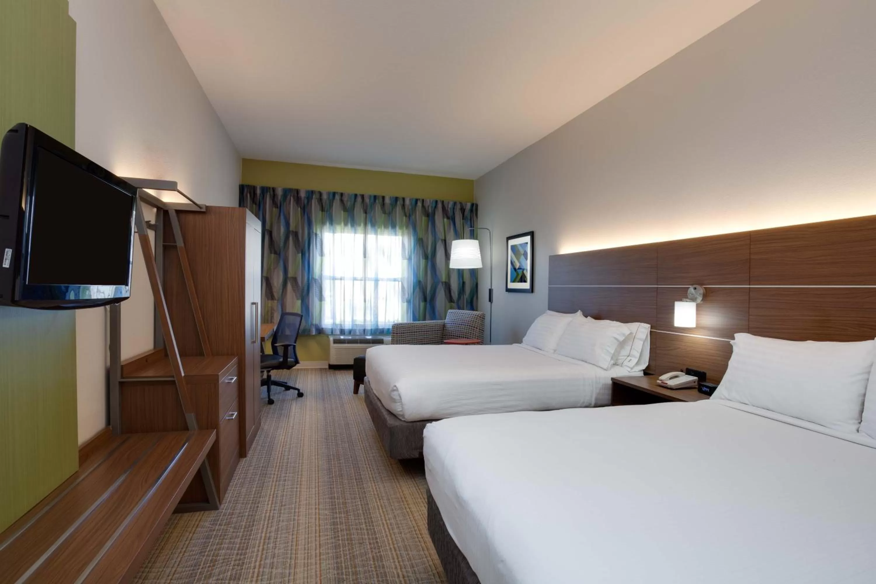 Bed in Holiday Inn Express & Suites Orlando International Airport by IHG
