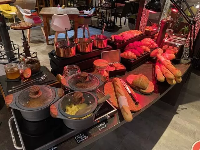 Breakfast in Logis Central Hôtel - Restaurant & Spa