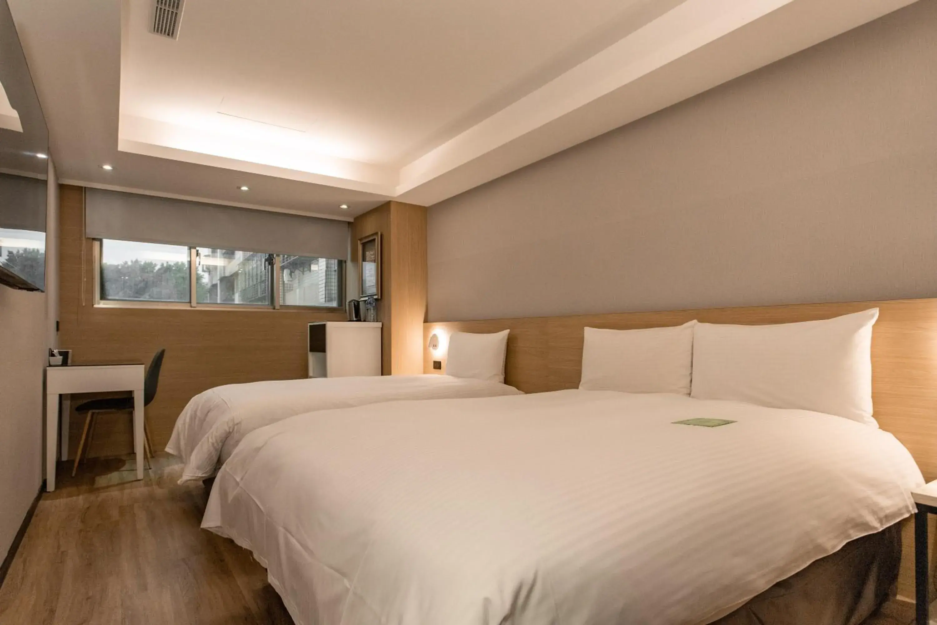 Bed in Hub Hotel Tucheng