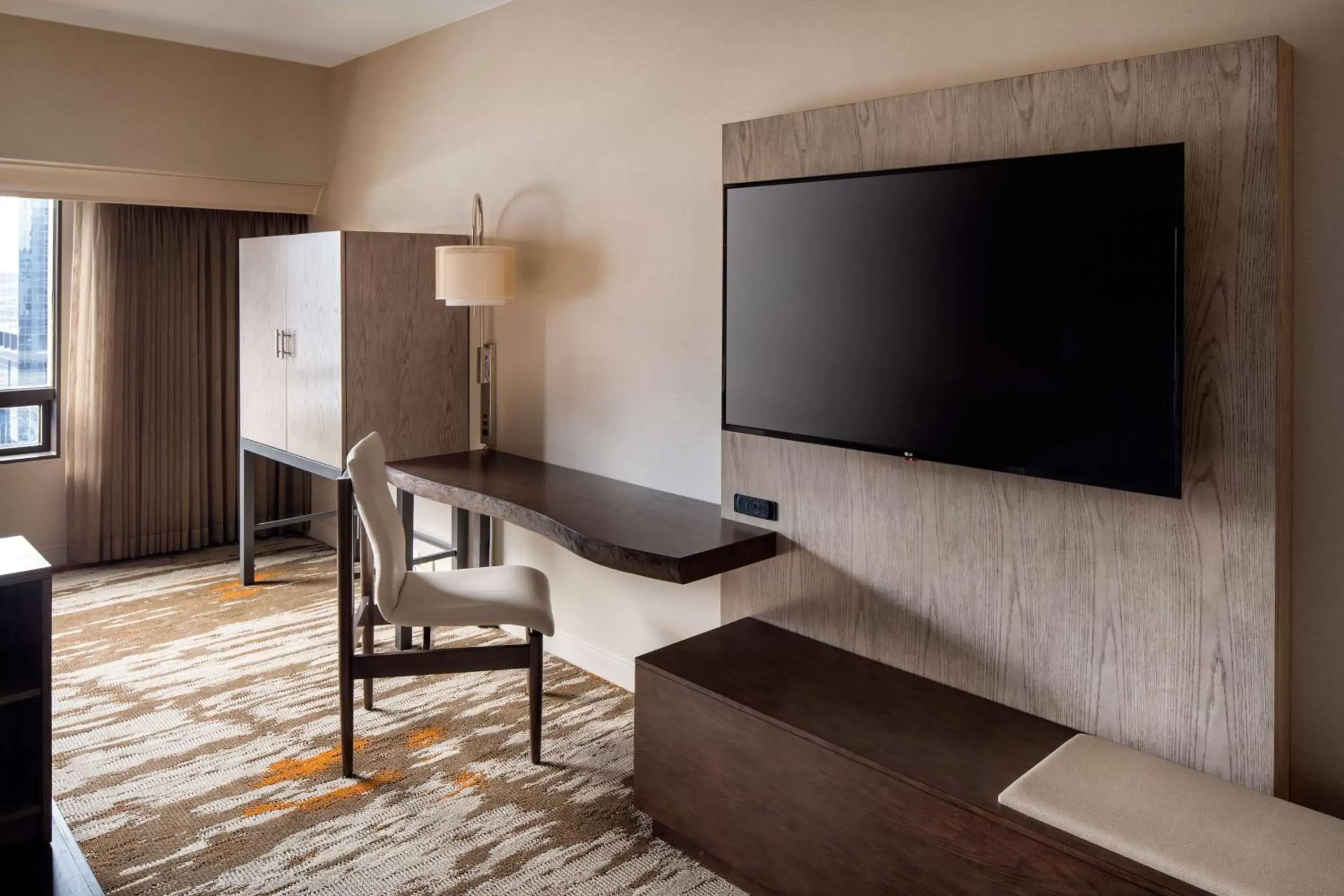 Bedroom, TV/Entertainment Center in Hilton Denver City Center