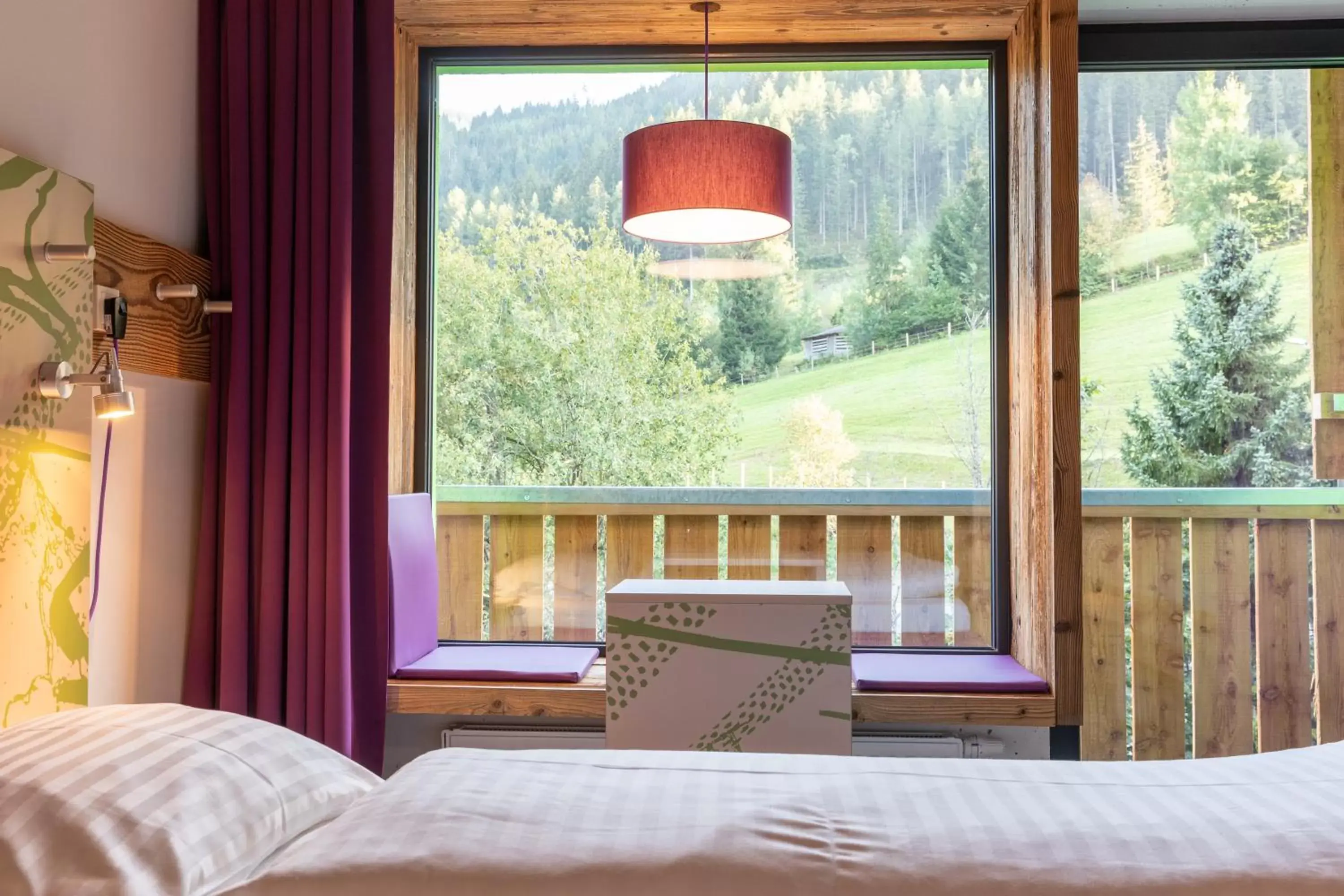 Living room, Bed in Explorer Hotel Neuschwanstein