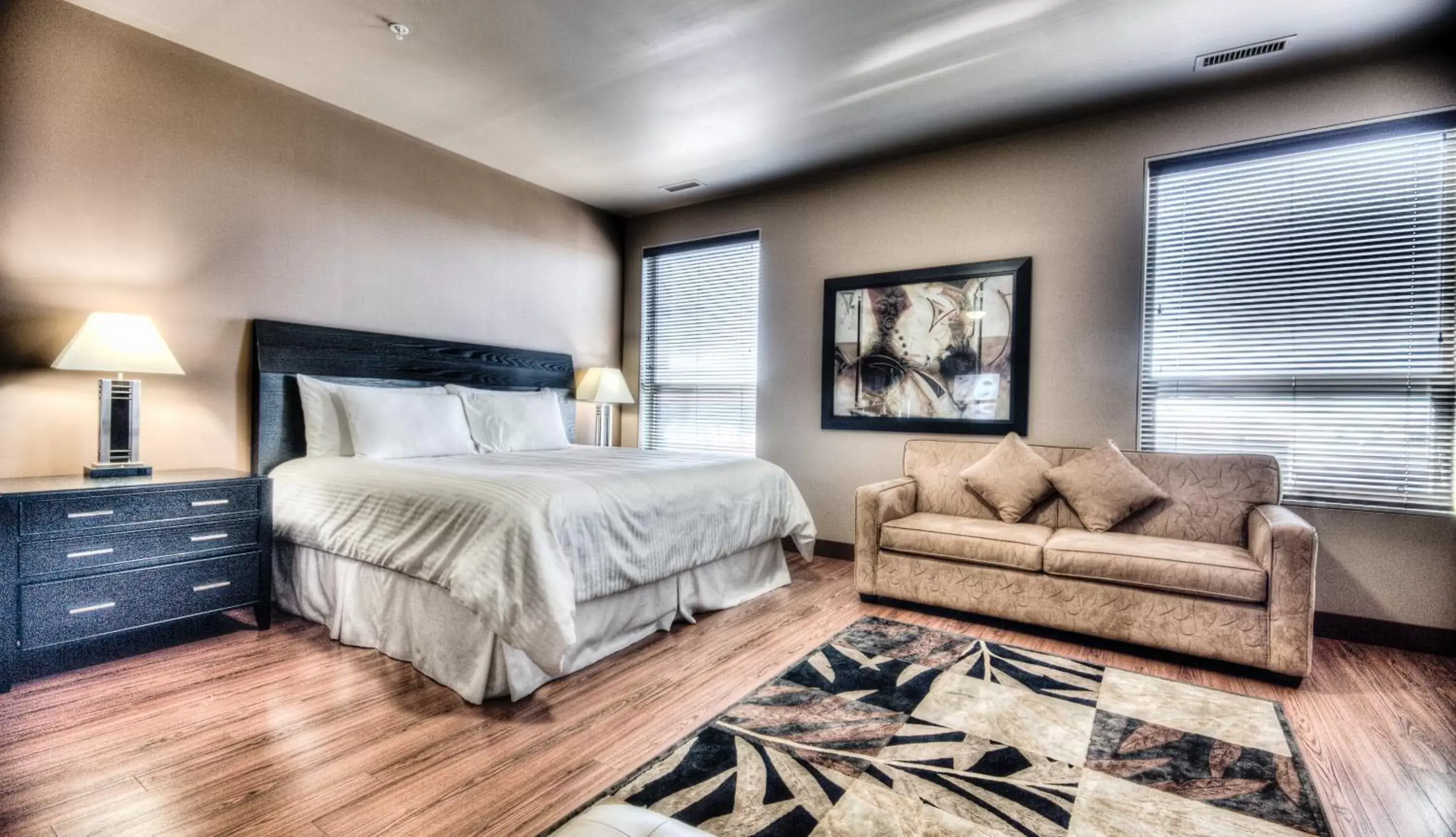 Bed in Grand Inn & Residence- Grande Prairie