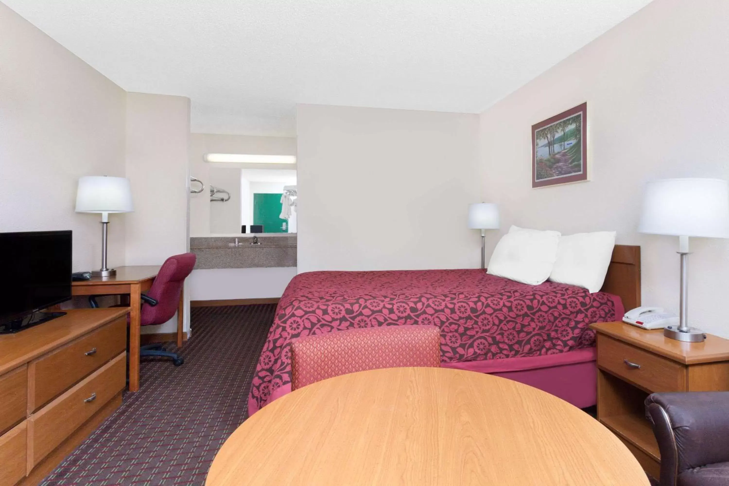 Photo of the whole room, Bed in Days Inn by Wyndham Columbia NE Fort Jackson