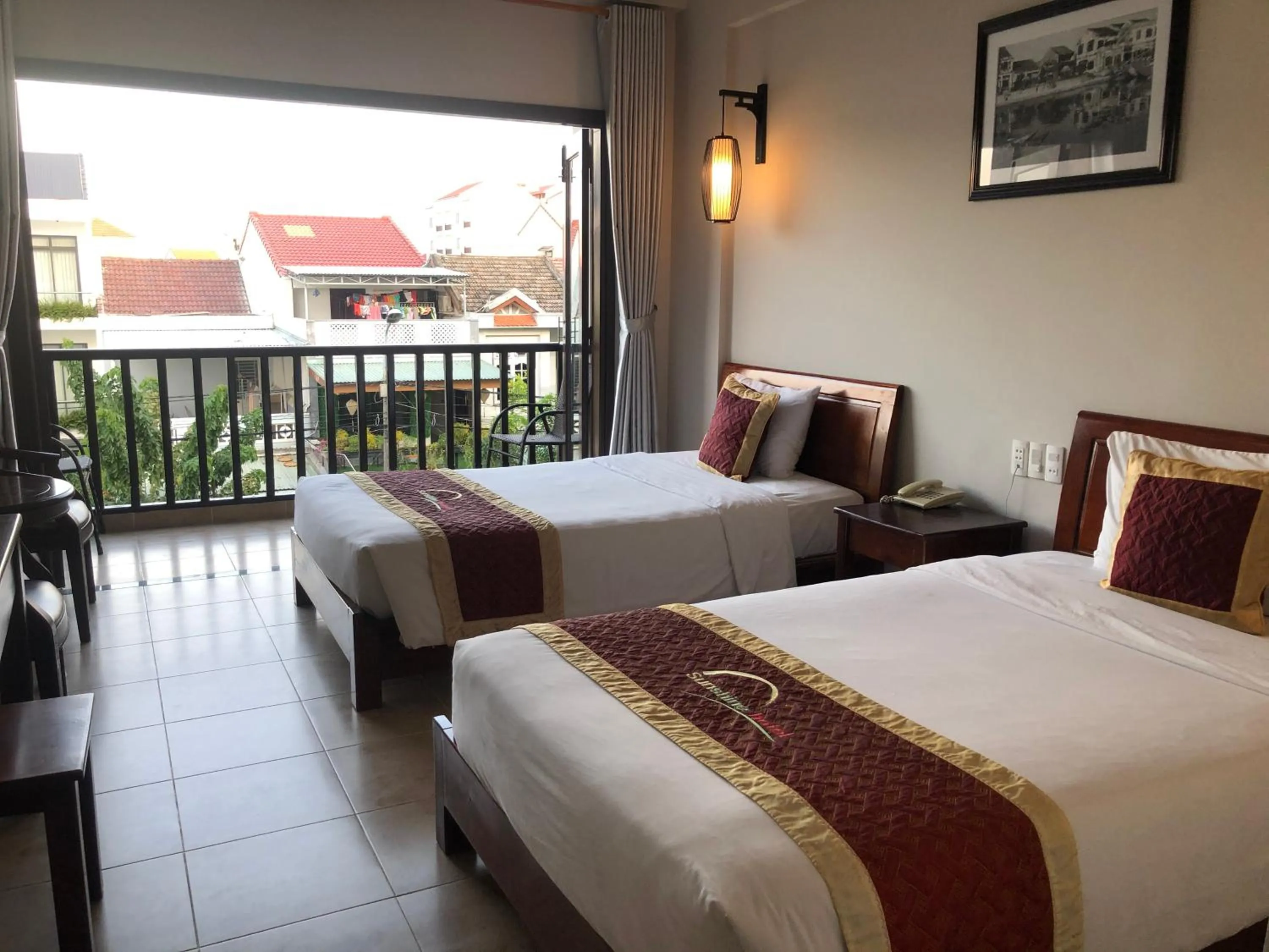 Bed in Sunshine Hoian Hotel