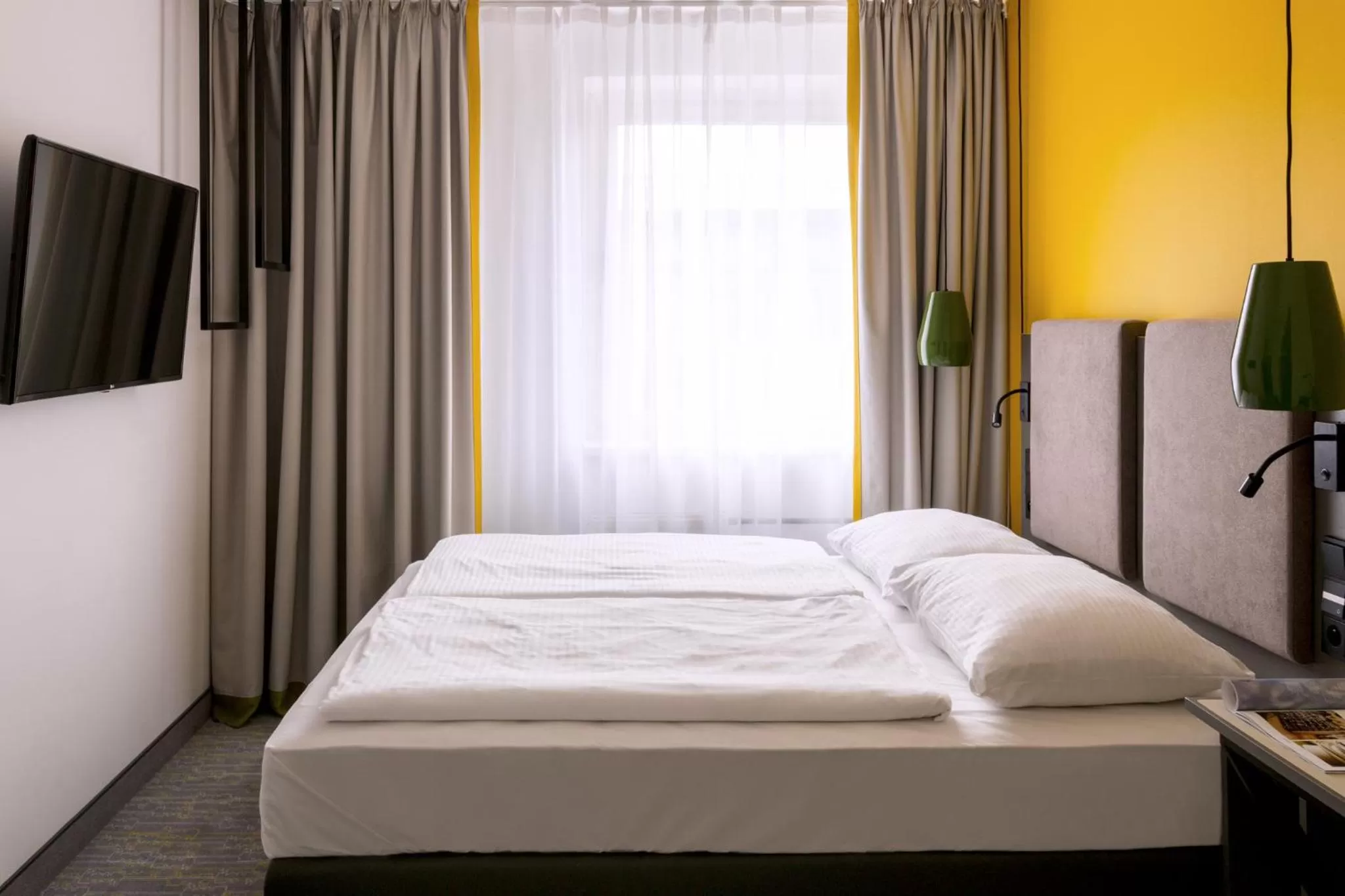 Bedroom, Bed in Vienna House Easy by Wyndham Cracow