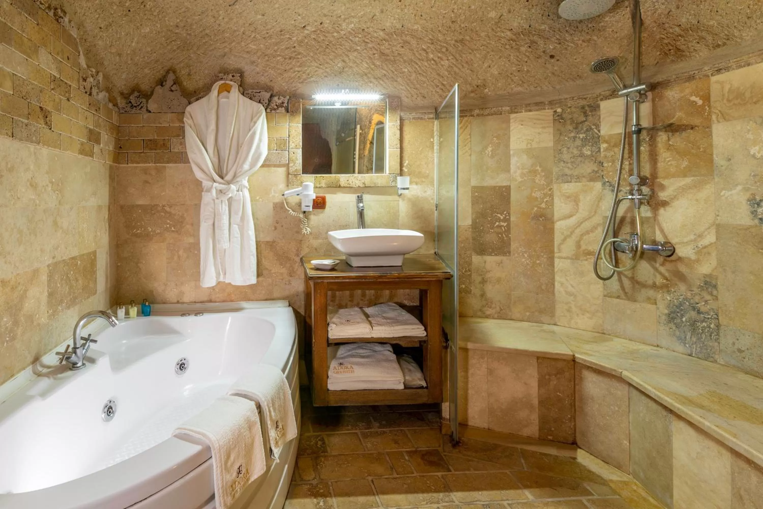 Bathroom, Bed in Adora Cave Suites -