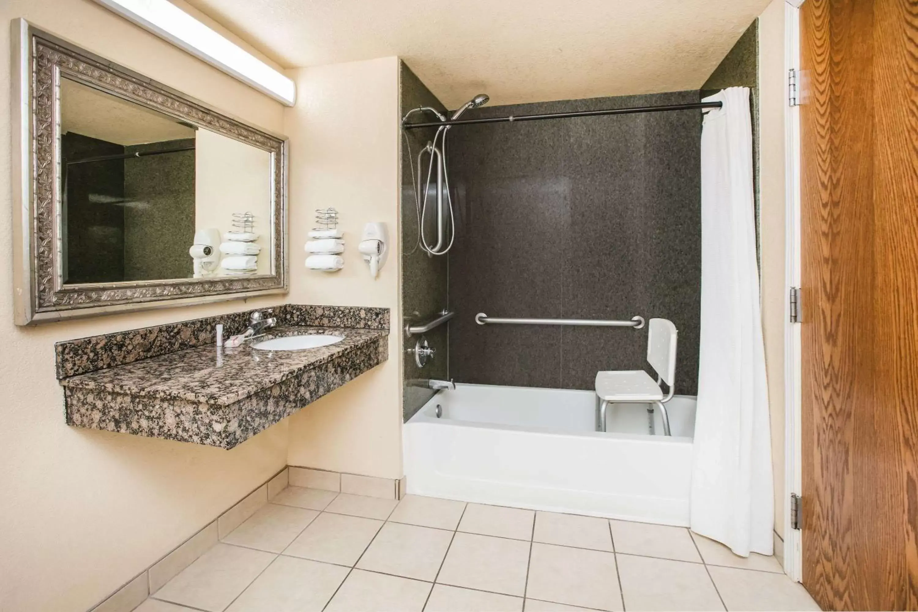 Bathroom in Super 8 by Wyndham Oklahoma Airport Fairgrounds West