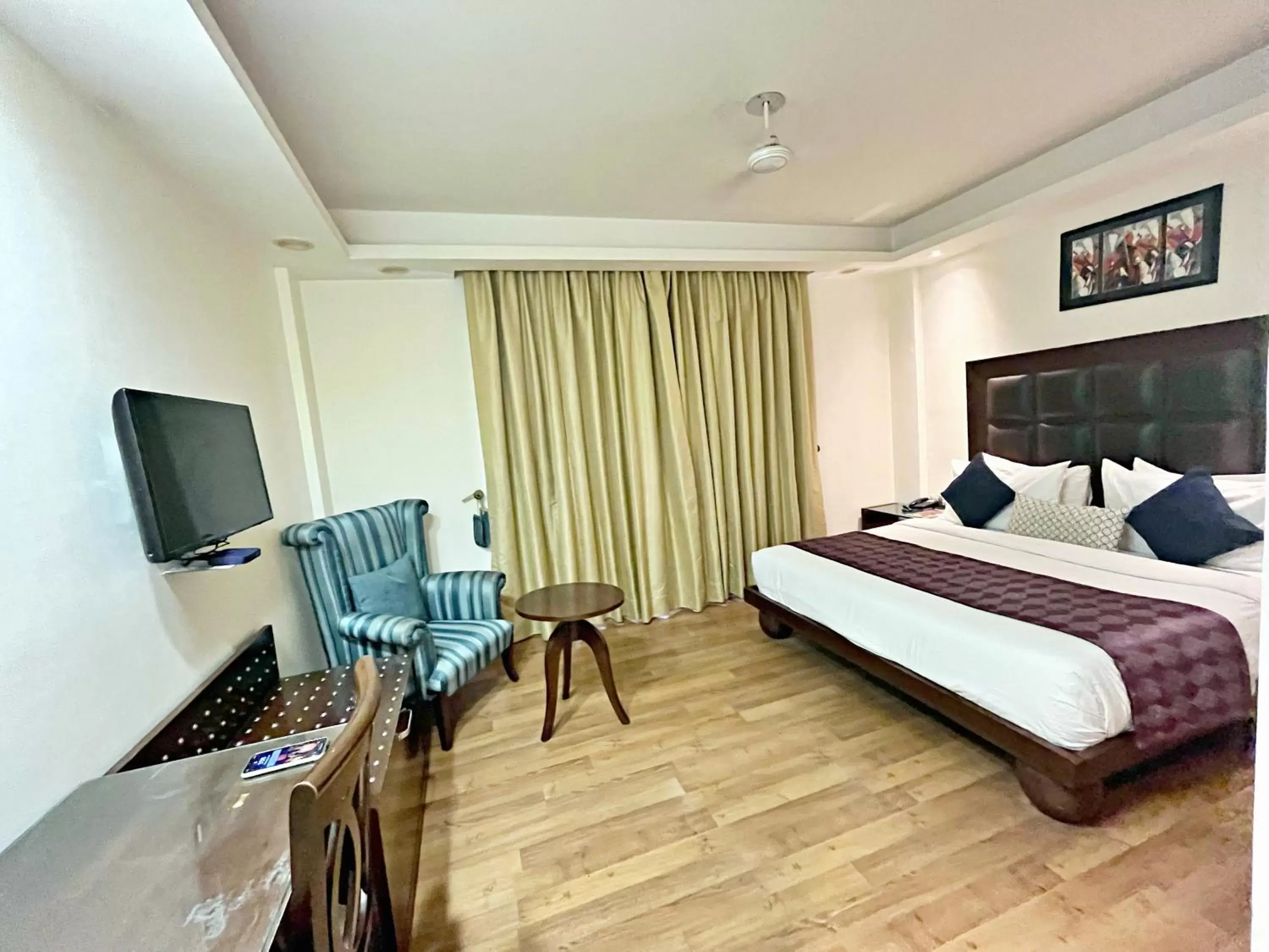 Bed, TV/Entertainment Center in The Grand Orion - Kailash Colony