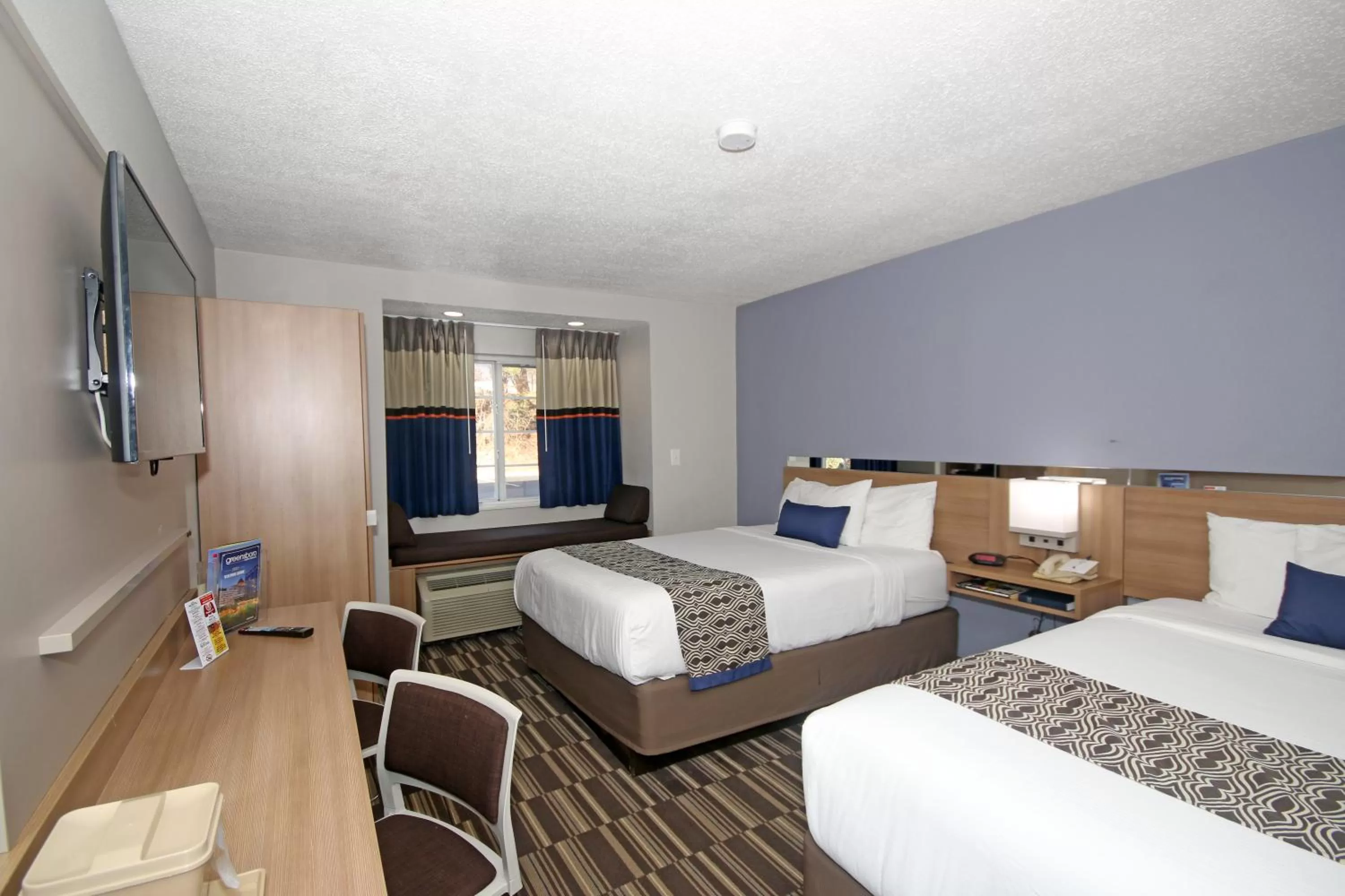 Photo of the whole room, Bed in Microtel Inn by Wyndham Greensboro