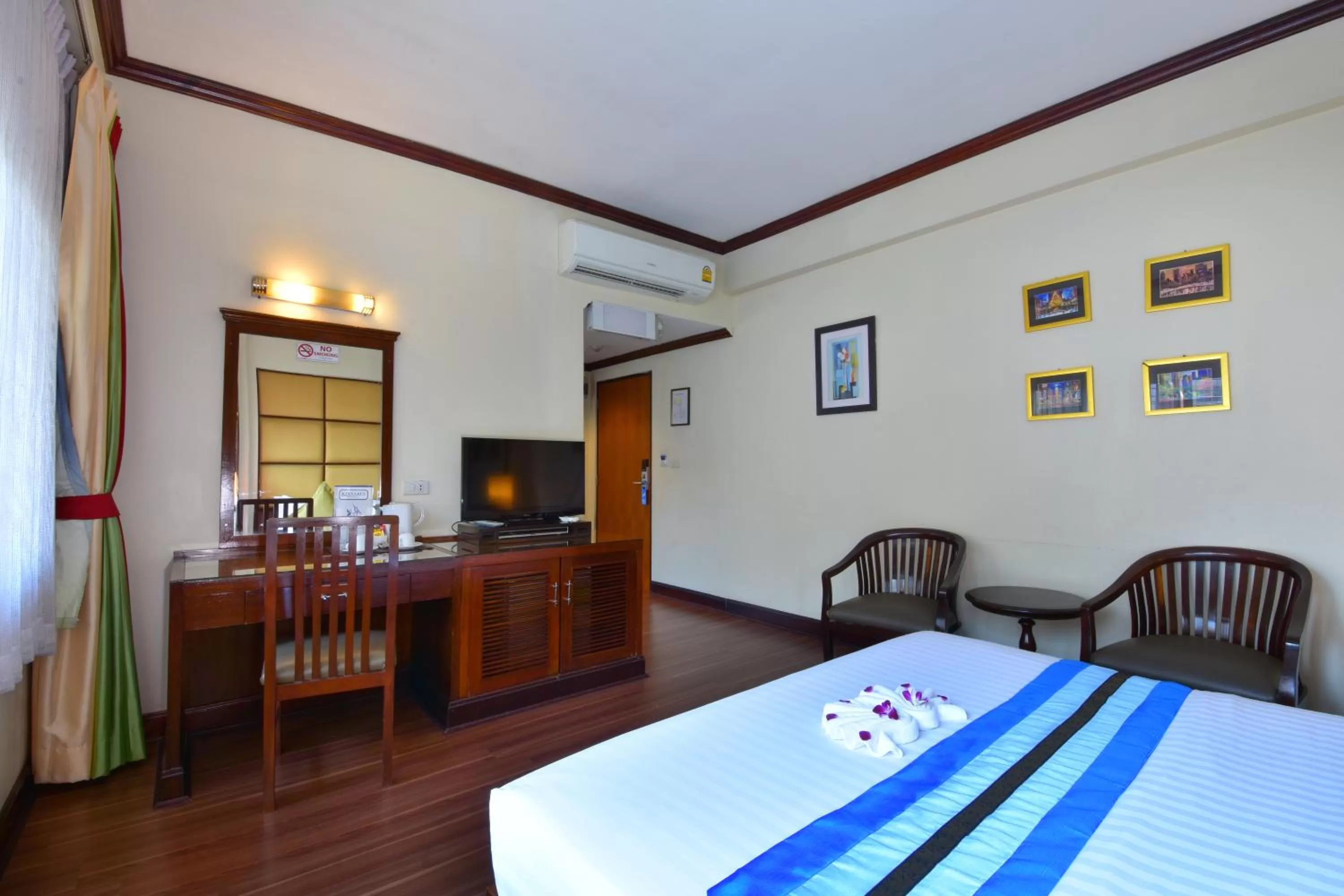 Bedroom in Grand Business Inn