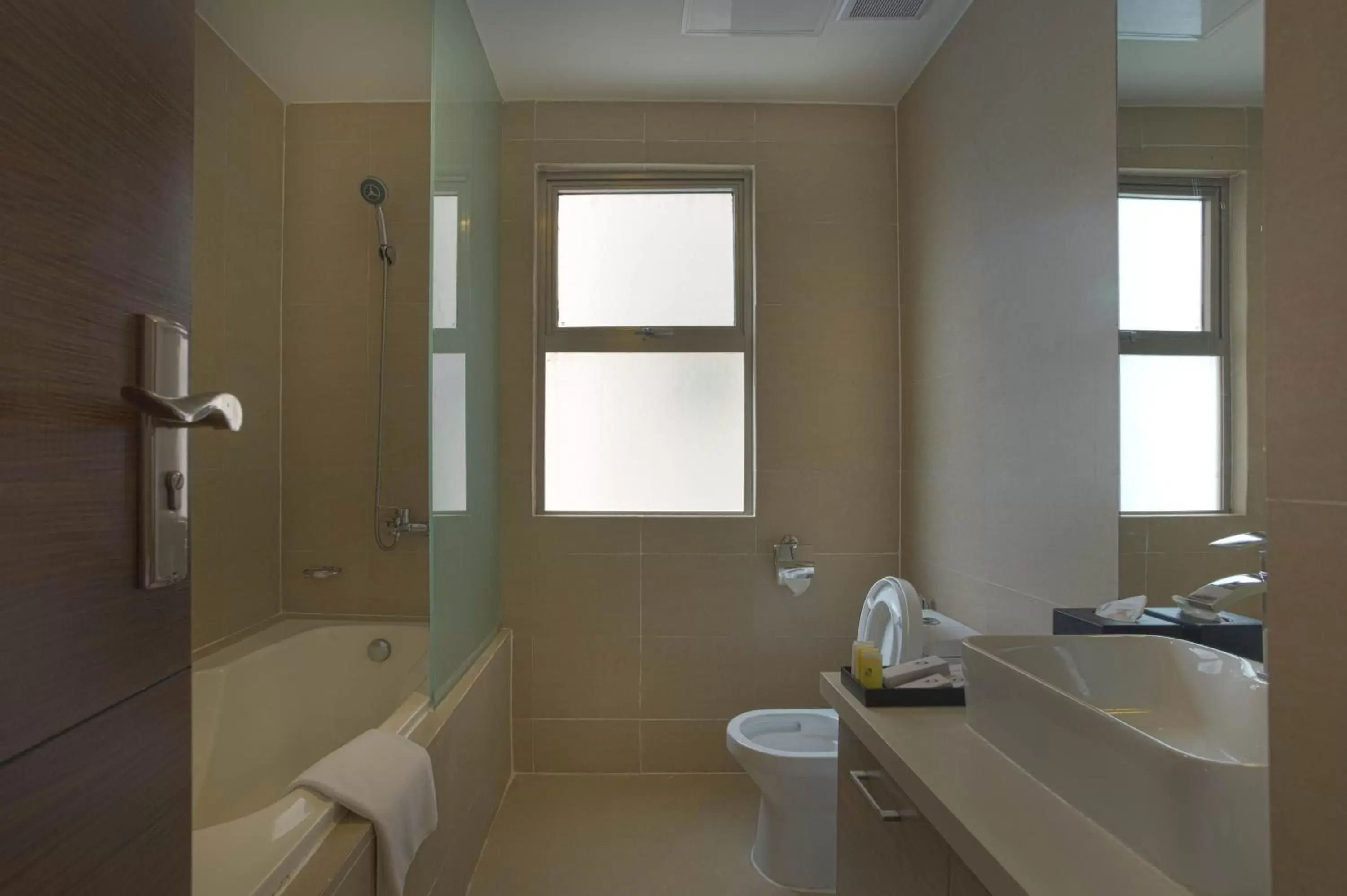 Bathroom in Valero Grand Suites by Swiss-Belhotel