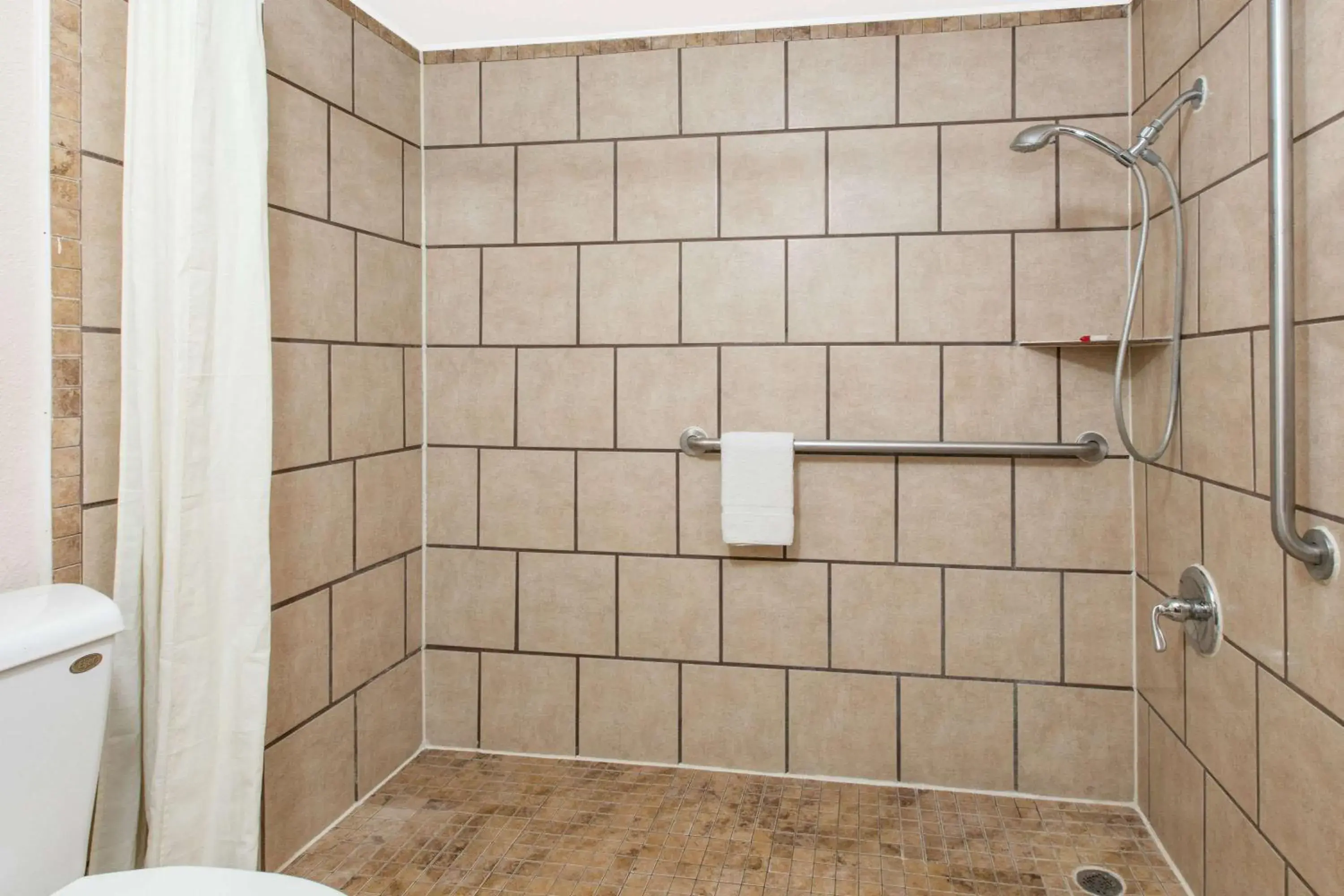 Shower, Bathroom in Super 8 by Wyndham Lubbock Civic Center North