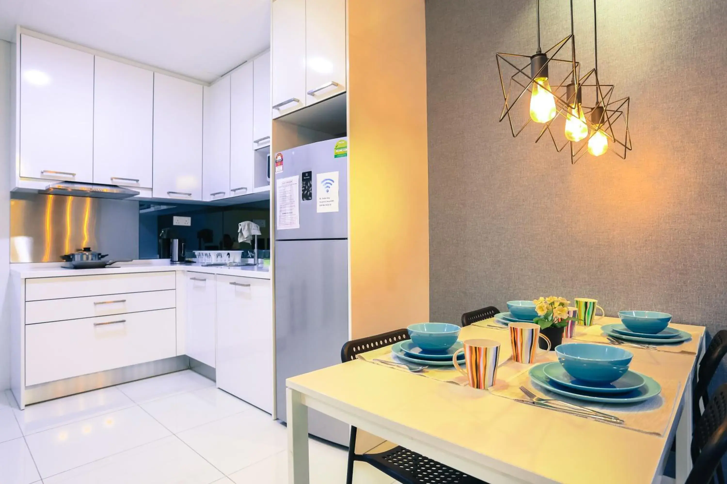 Dining area, Kitchen/Kitchenette in Mercu Summer Suite KLCC @ Penguin Homes