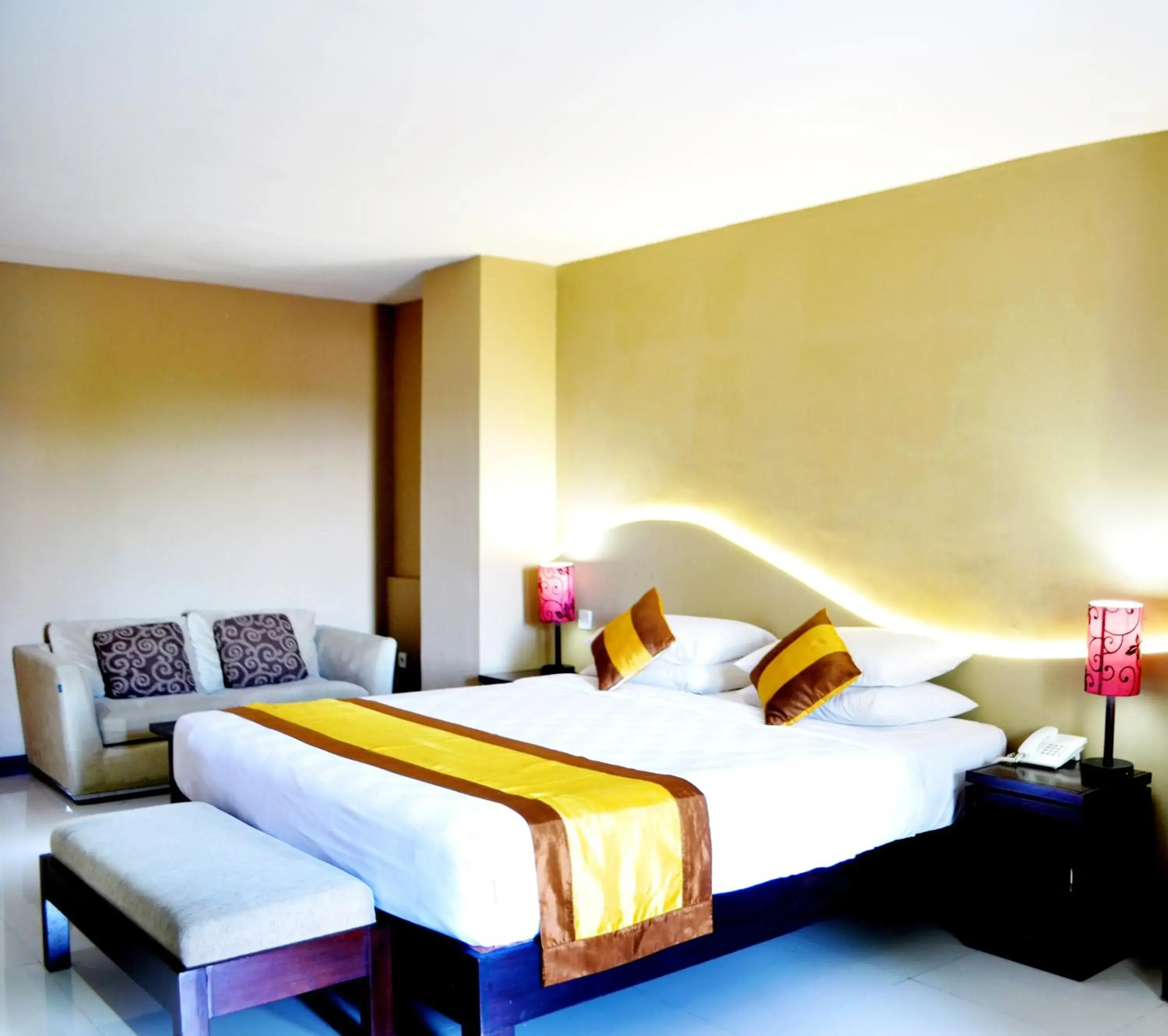 Bed in Nirmala Hotel & Convention Centre