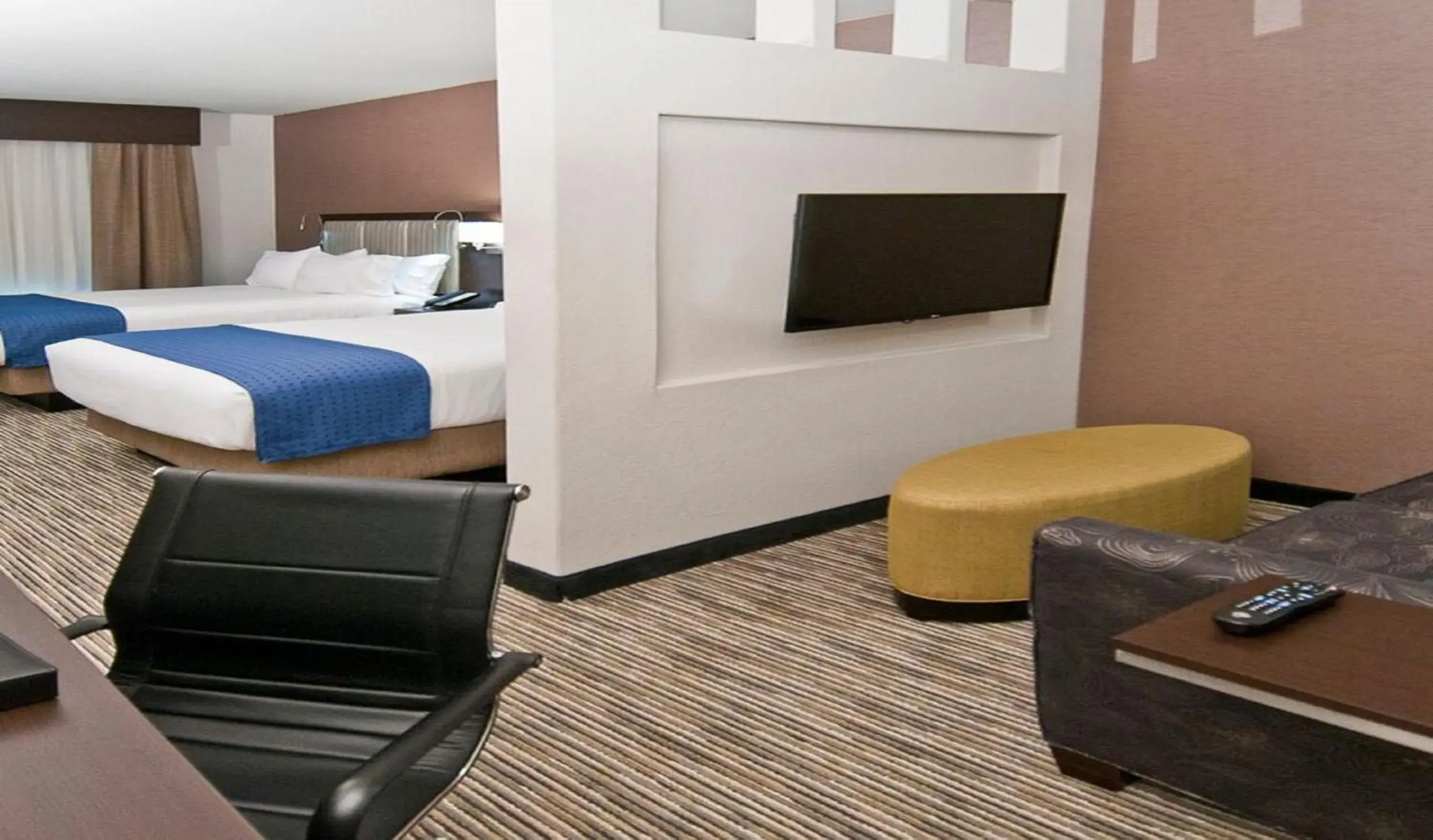 Photo of the whole room, TV/Entertainment Center in Holiday Inn Austin Airport, an IHG Hotel