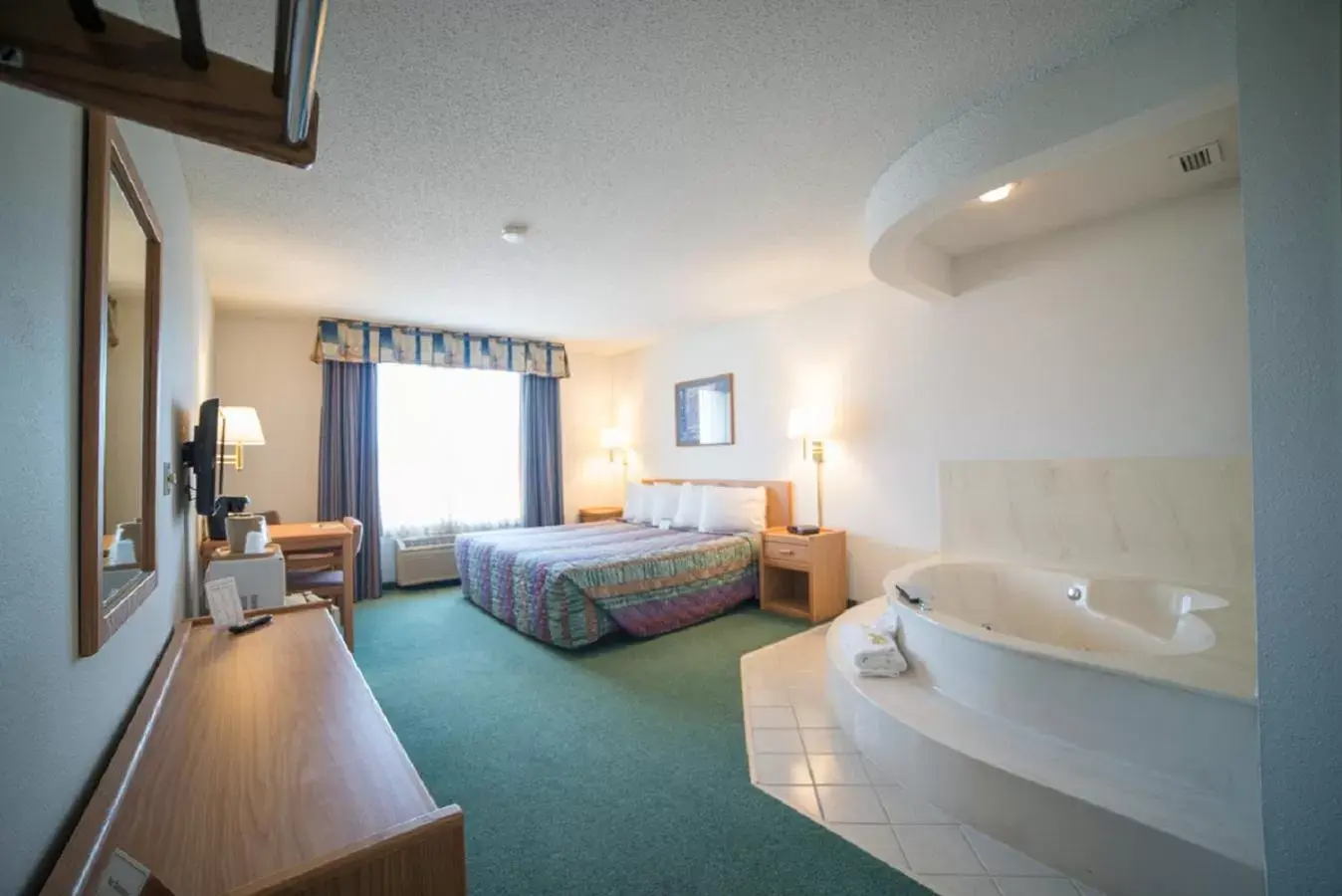 Bedroom in River Valley Inn & Suites