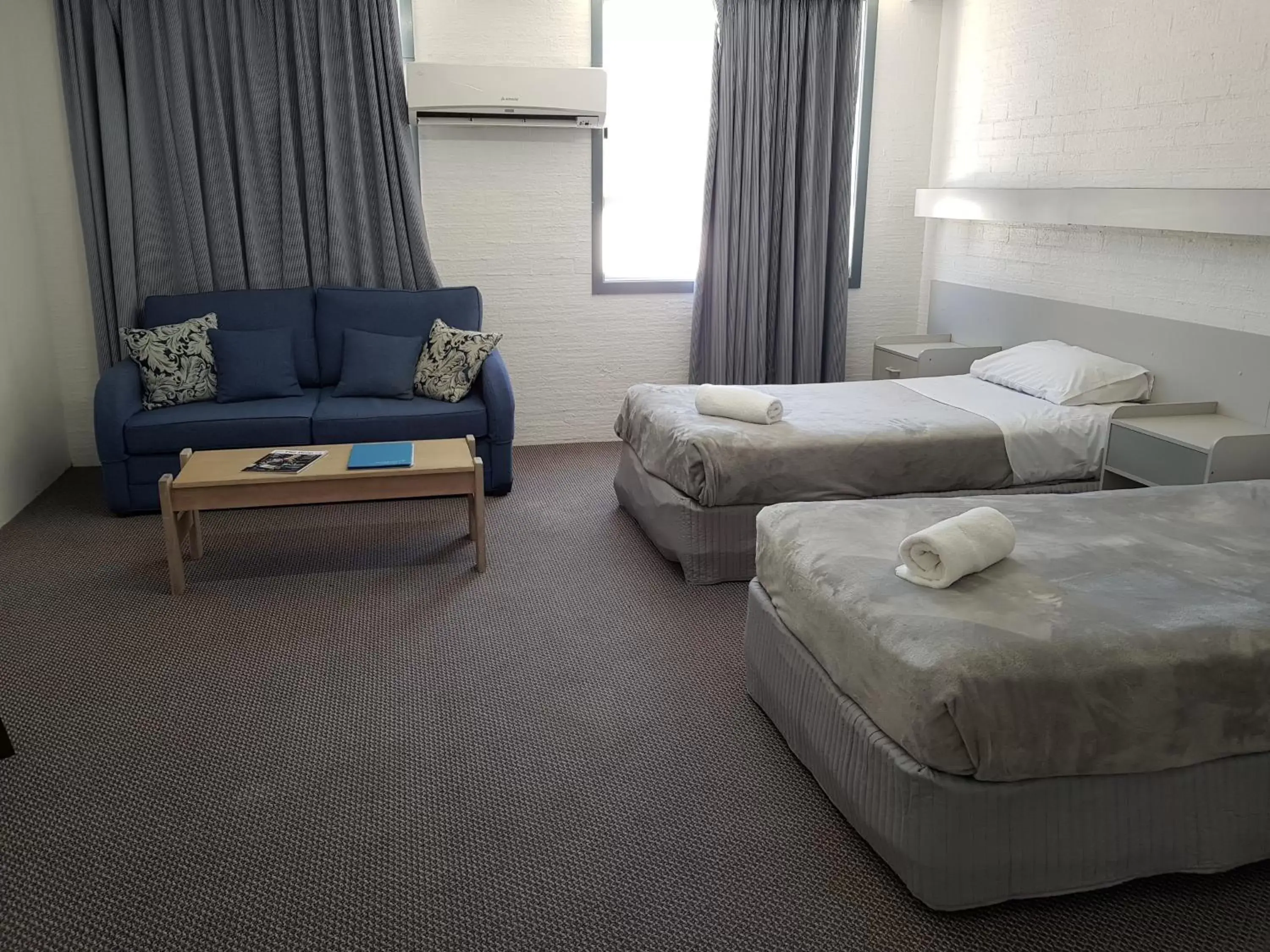 Seating area, Bed in Seabreeze Beach Hotel