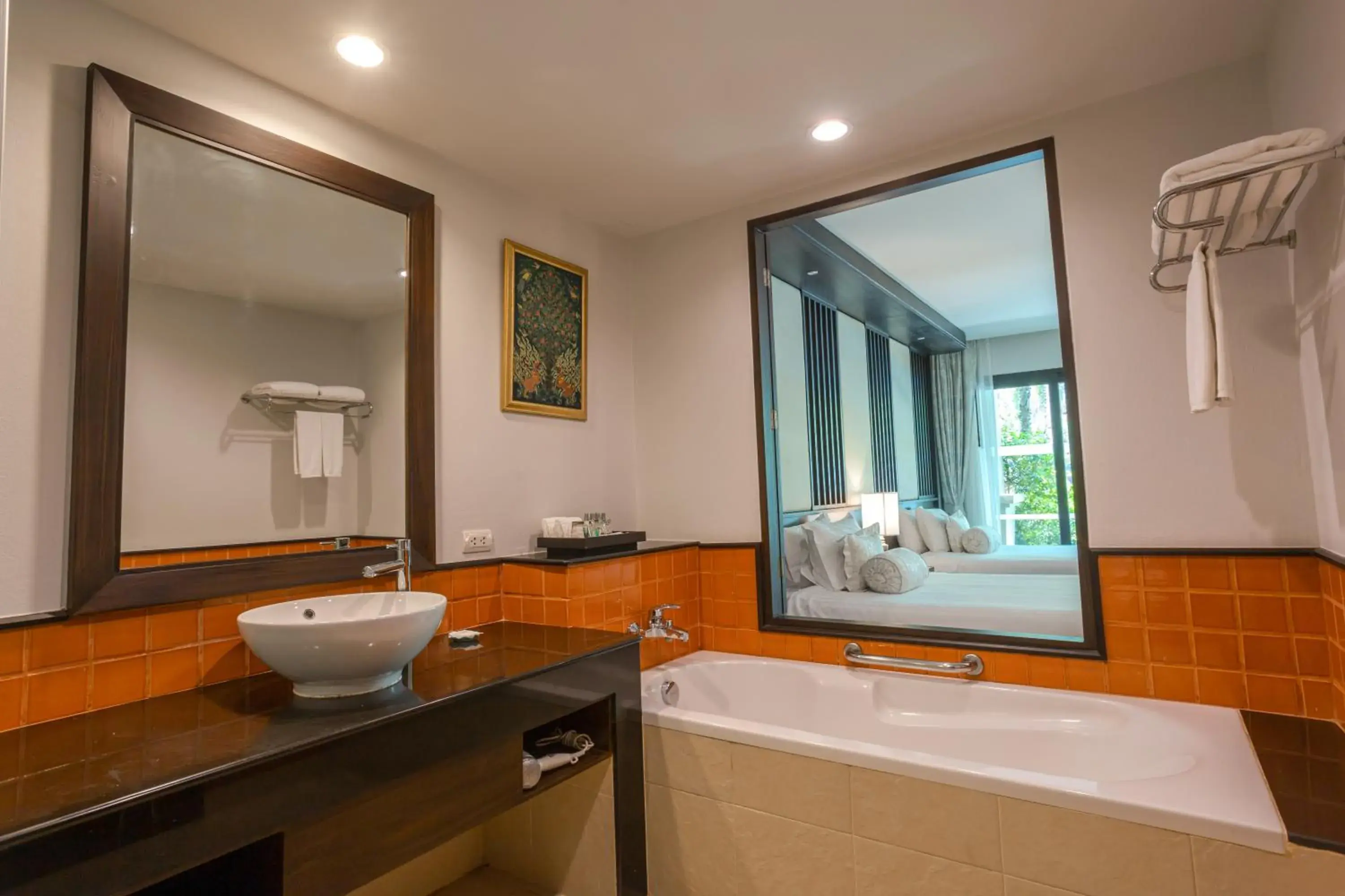 Bathroom in Ravindra Beach Resort & Spa - SHA Extra Plus