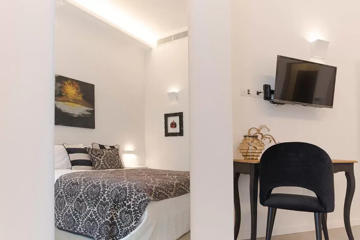 Bed in A Misura Duomo Rooms & Apartment