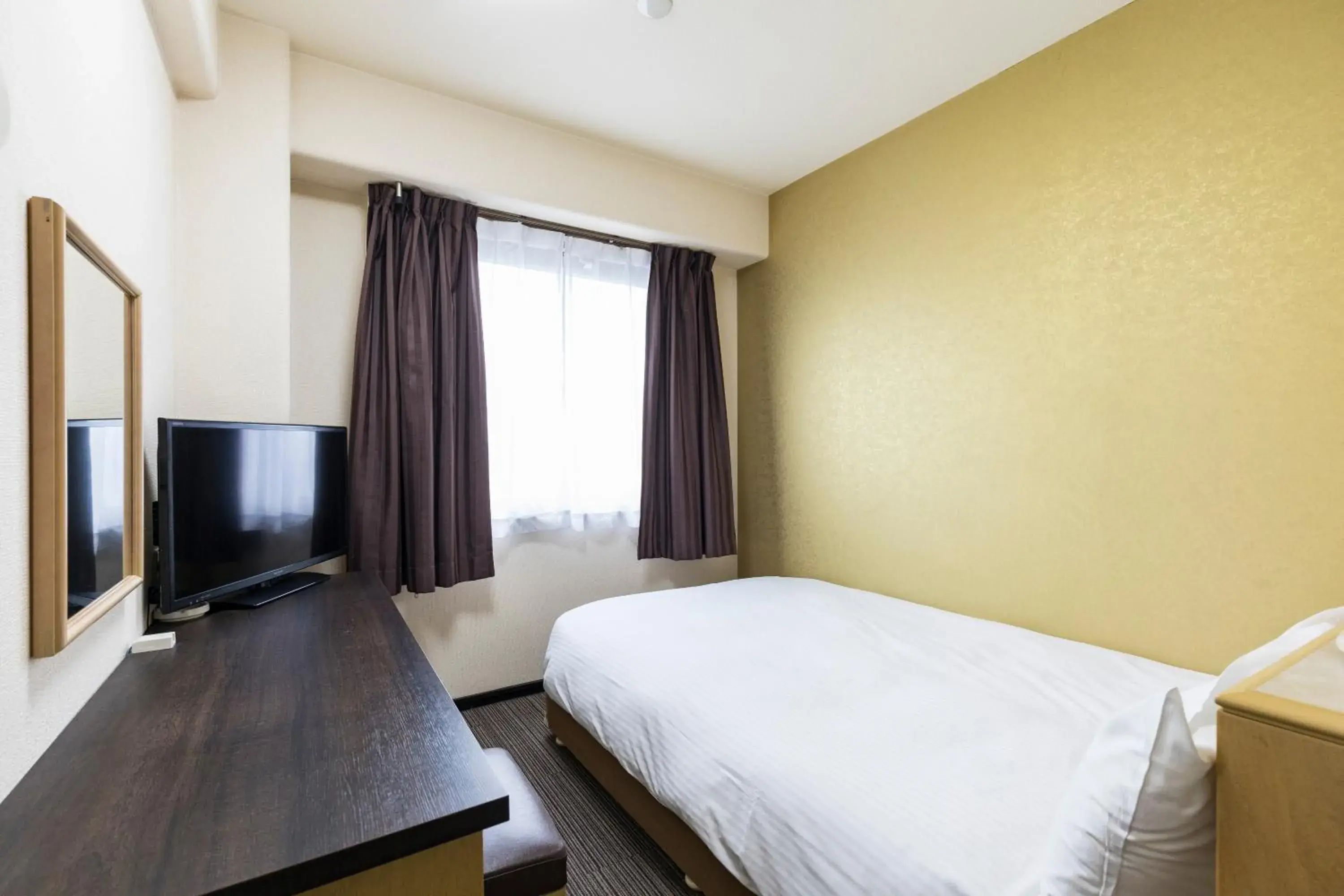 Bed in Hotel Wing International Kumamoto Yatsushiro