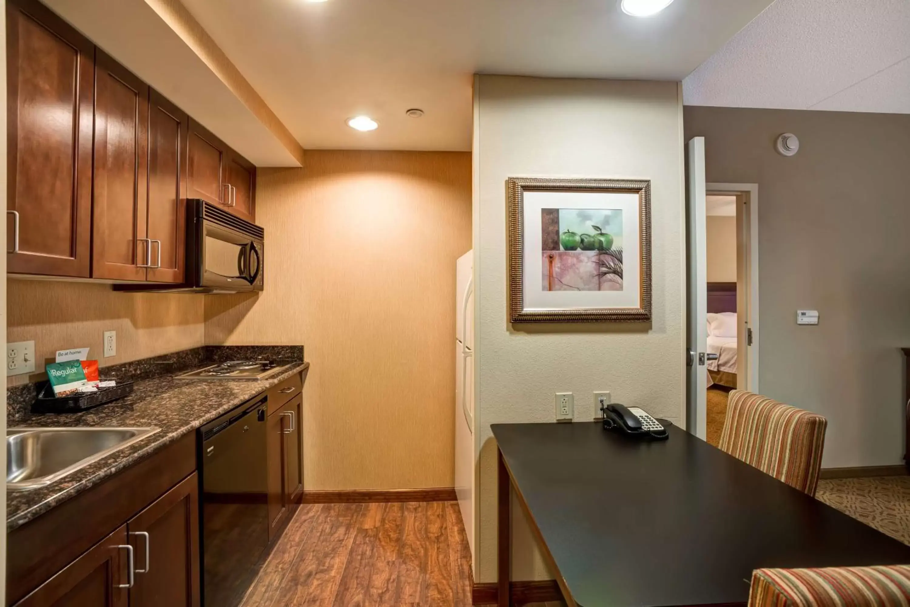 Bedroom, Kitchen/Kitchenette in Homewood Suites Fredericksburg