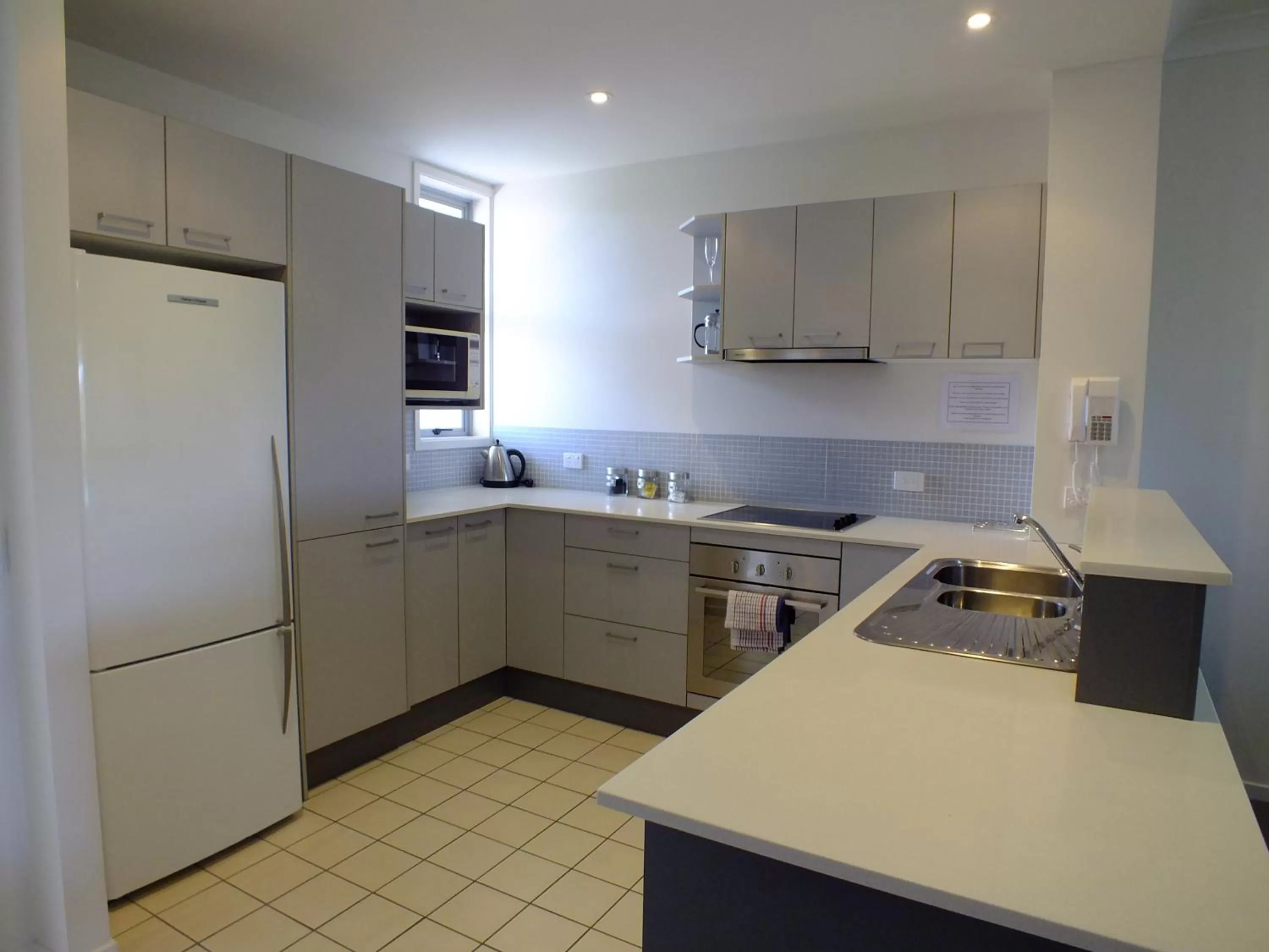 Kitchen or kitchenette in Pacific Marina Apartments