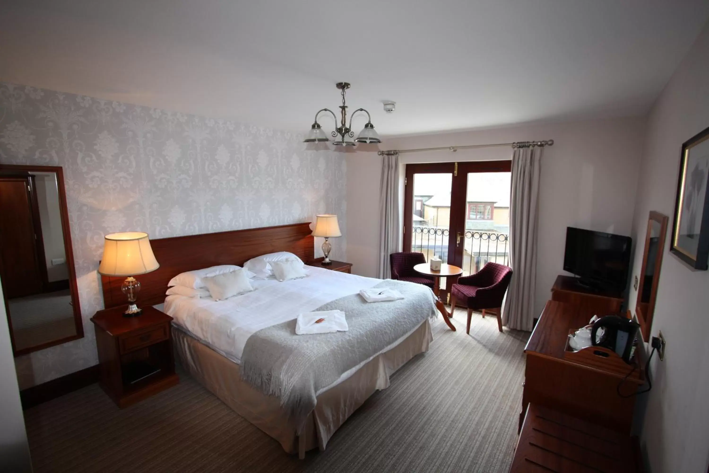 Photo of the whole room, Bed in The Mary Mount Hotel