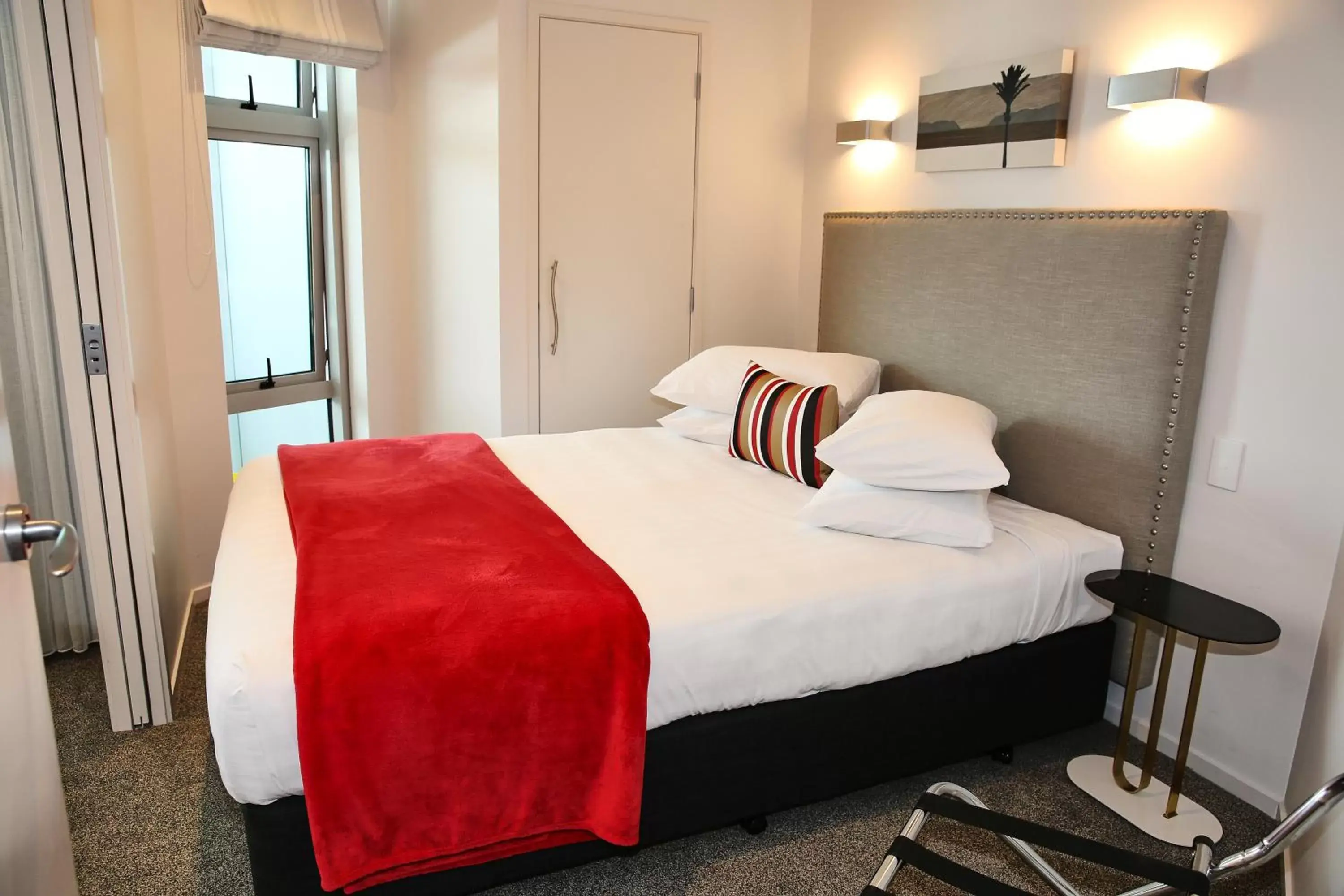 Bedroom, Bed in Ramada Suites by Wyndham Nautilus Orewa