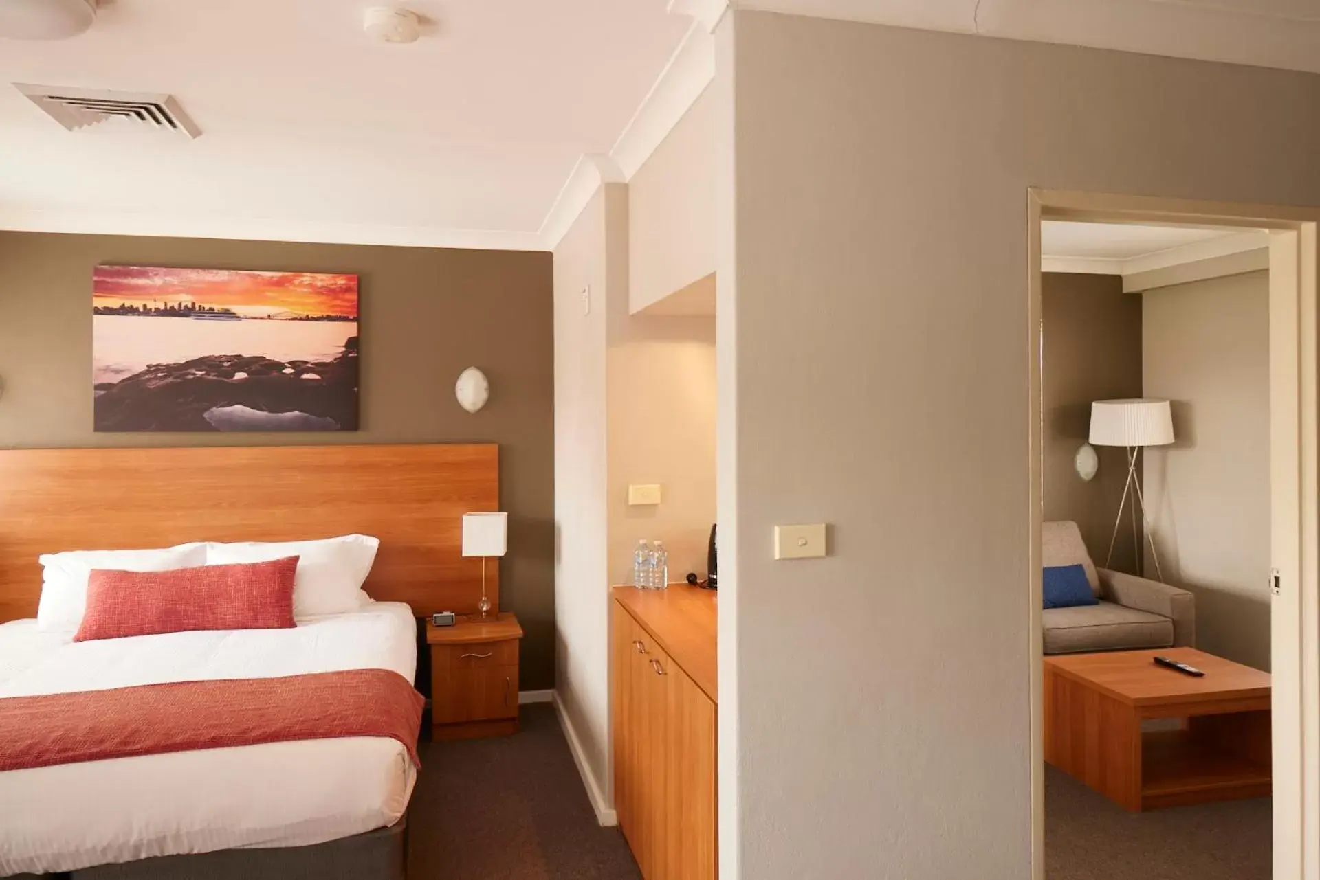 Bed in Ramada Hotel & Suites by Wyndham Cabramatta