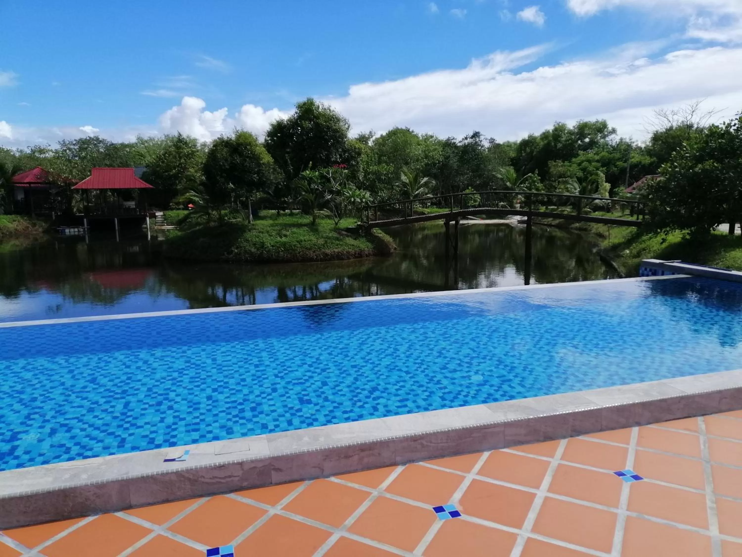 Swimming pool in Api-api Eco Chalet