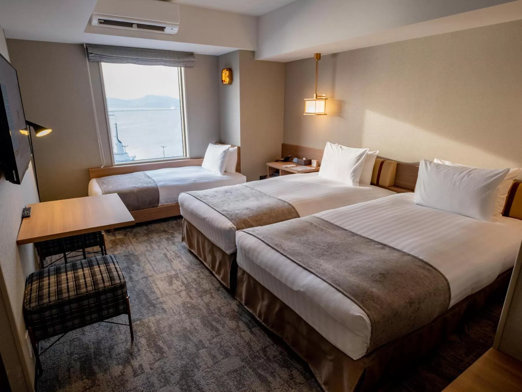 Bed in Tokyu Stay Hakodate Asaichi Akarinoyu