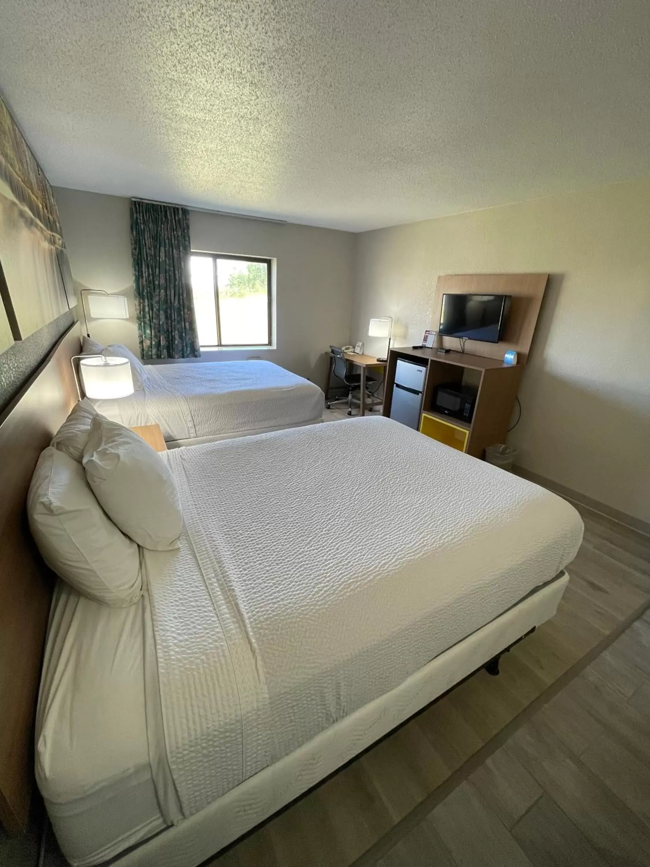 Bed in Days Inn by Wyndham Alpena
